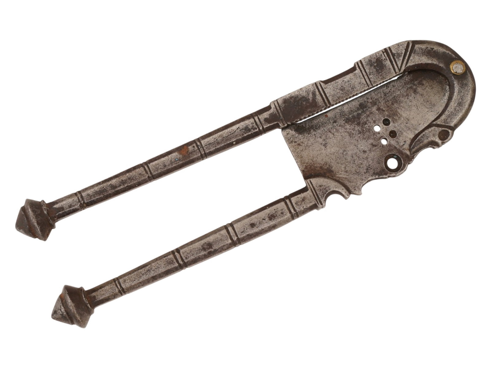ANTIQUE INDIAN BETEL NUT CUTTER SAROTA: An antique Indian sarota, or betel nut cutter, is constructed from forged iron and features a traditional hinged lever mechanism designed for slicing dried areca nuts. The tool is composed of two tape