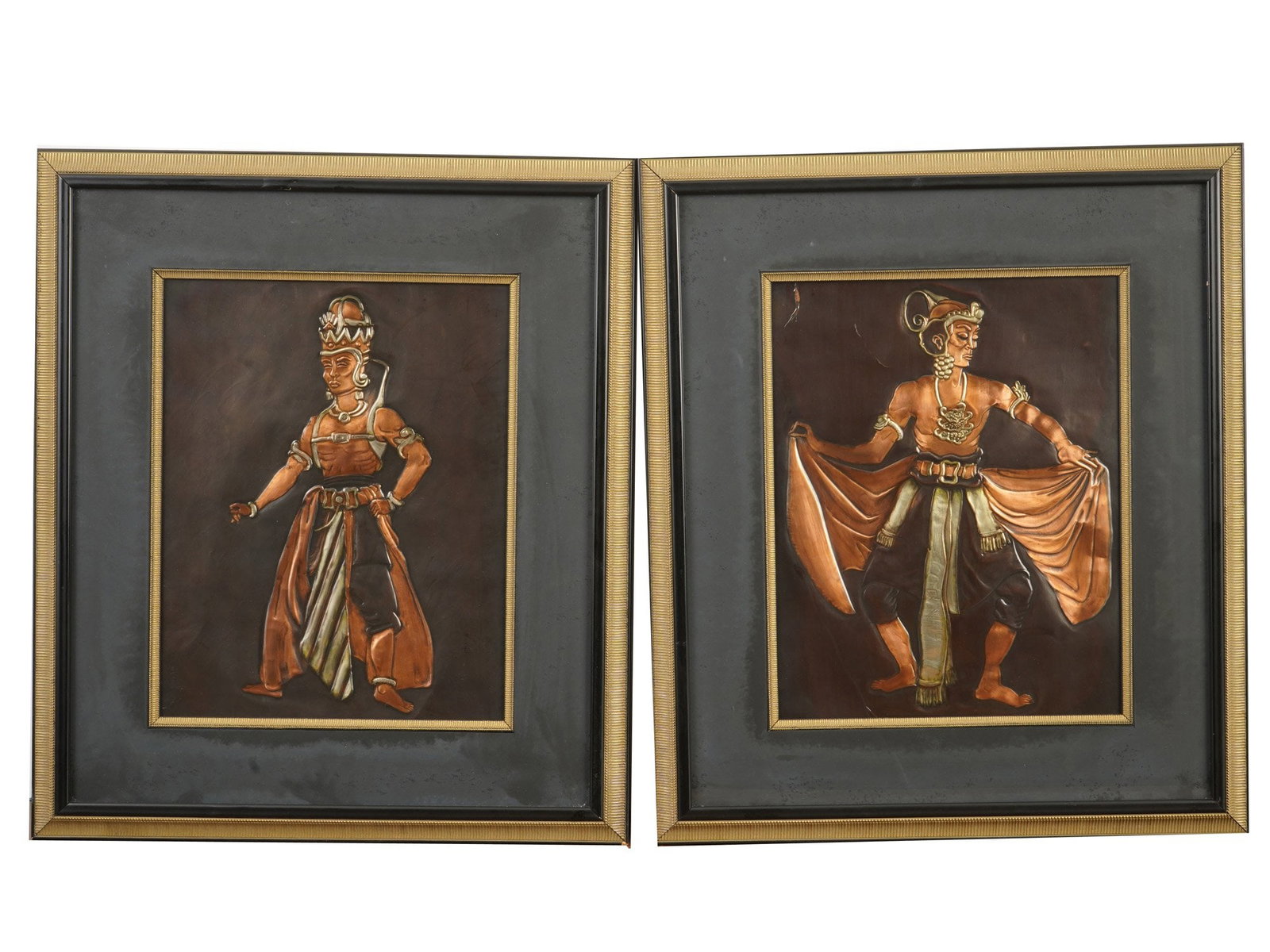 TWO VINTAGE INDONESIAN COPPER RELIEF PLAQUES: A lot of two vintage Indonesian copper relief plaques. Both pieces depict traditional dancers from Indonesian art. Matted and framed. Home Decor and Collectibles. THIS LOT IS ELIGIBLE FOR A 30-DAY UNC