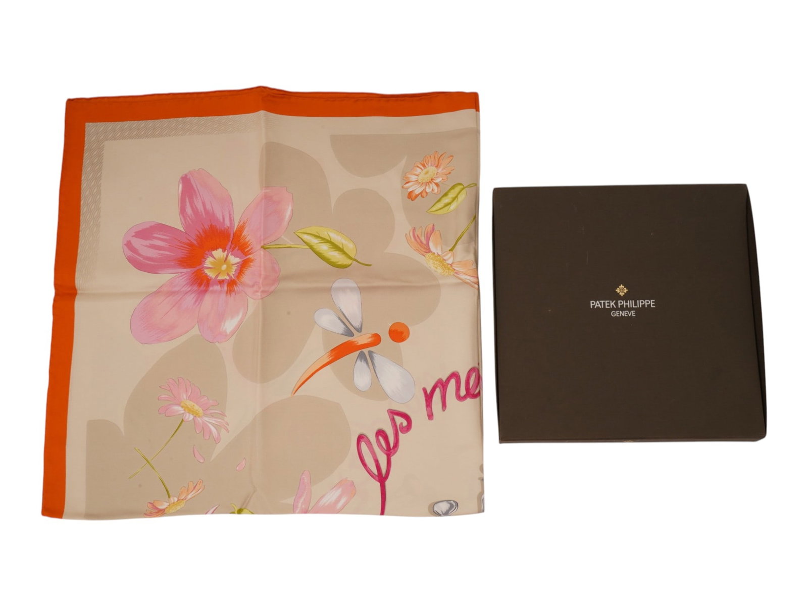 SWISS PATEK PHILIPPE SILK SCARF LES METIERS D ART IOB: A Swiss Patek Philippe silk scarf from Les Metiers d Art collection. The scarf features a beige and orange color palette with vibrant floral and dragonfly motifs. Marked Patek Philippe. Made in