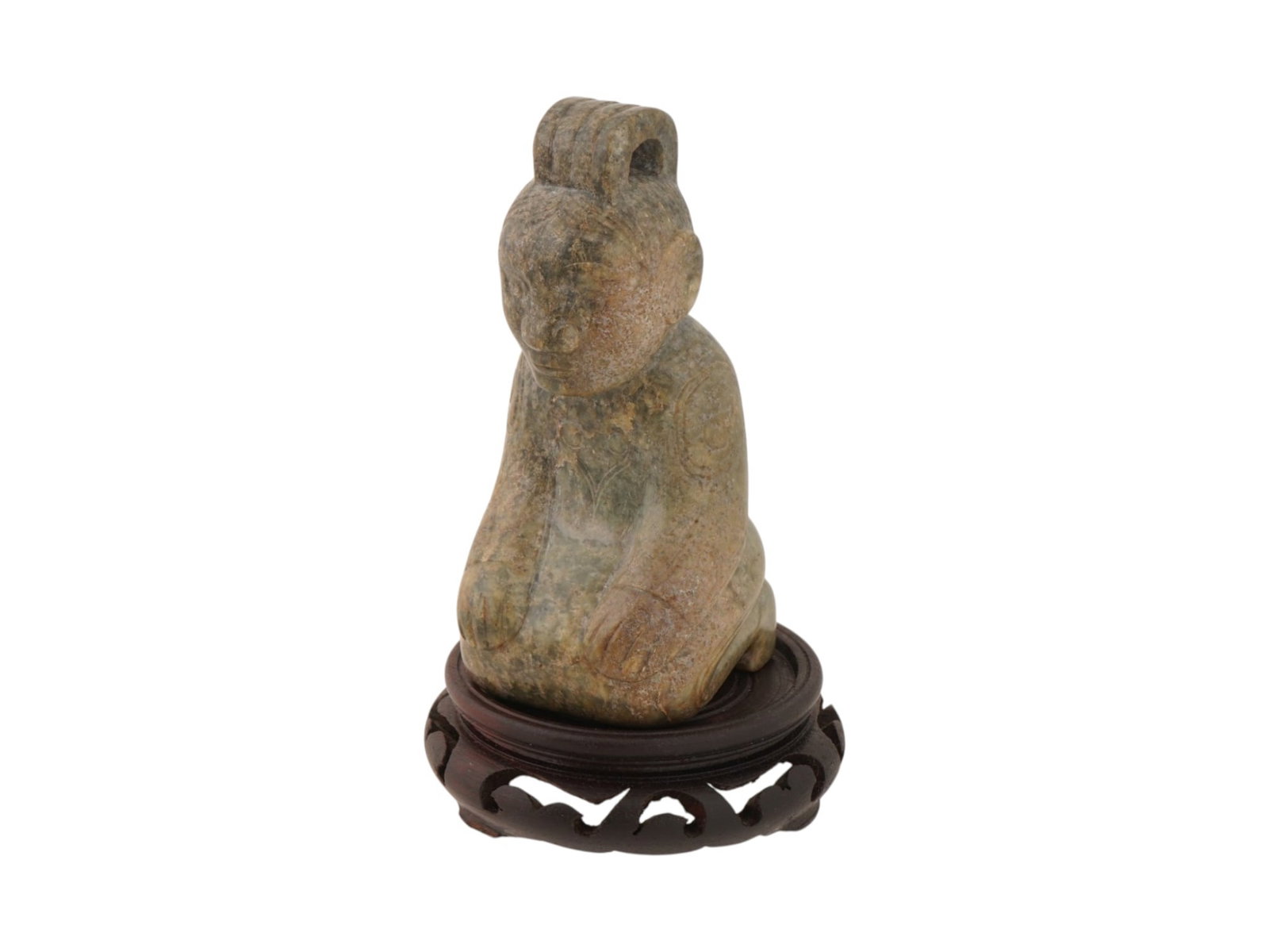 ANTIQUE CHINESE CARVED NEPHRITE JADE FIGURE ON A STAND: An antique Chinese carved nephrite jade figure depicting a kneeling human, presented on a custom-fitted hardwood display stand. The sculpture is carved with stylized robes and a distinctive topknot. L