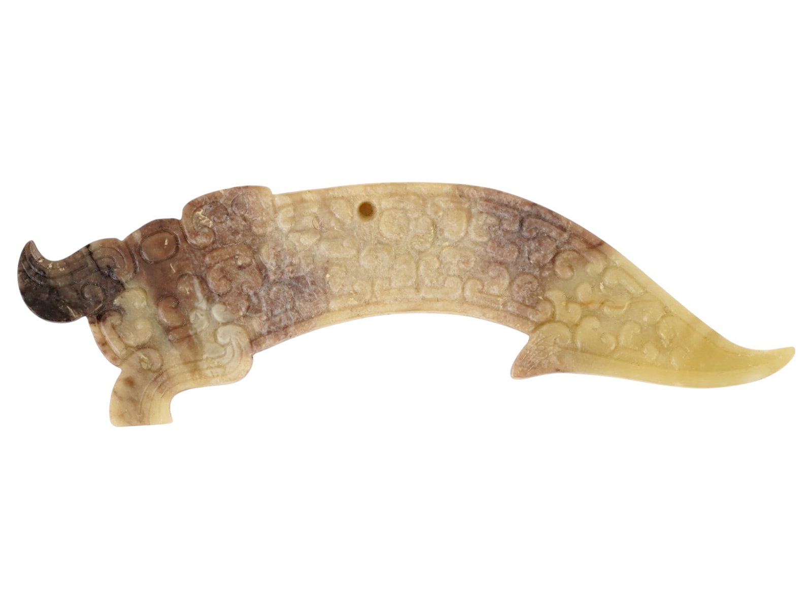 ANTIQUE CHINESE HAND CARVED JADE DRAGON PENDANT: A antique Chinese jade pendant is carved in an arched form depicting a stylized dragon, featuring a prominent head with a curved snout and a tapering tail. The surface is decorated with low-relief geo