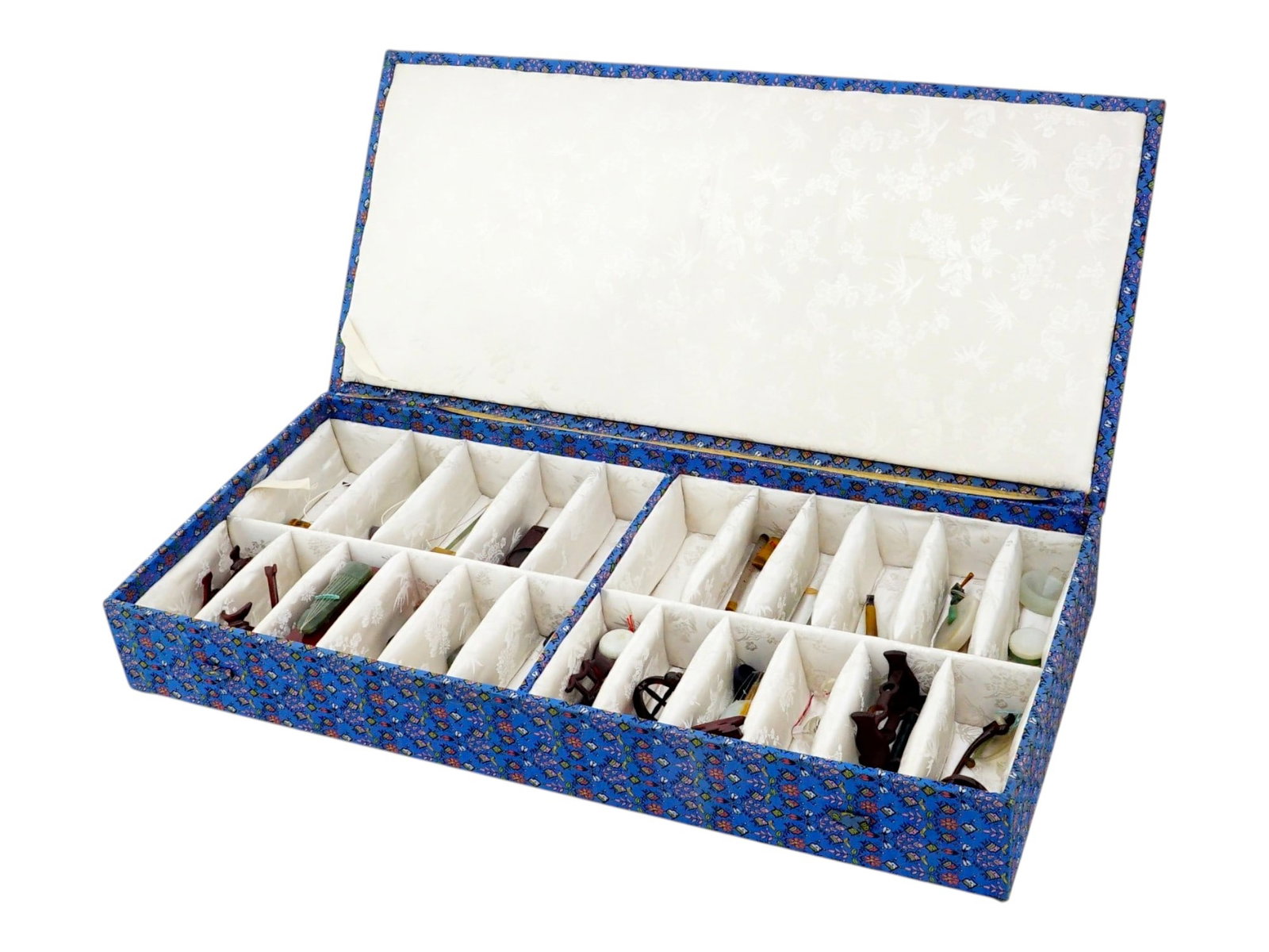 LOT OF CHINESE HARD STONE MINI MUSICAL INSTRUMENTS: A collection of numerous miniature Chinese musical instruments carved from a variety of hardstones, including jadeite, agate, and rose quartz. The set includes traditional forms such as the pipa, erhu