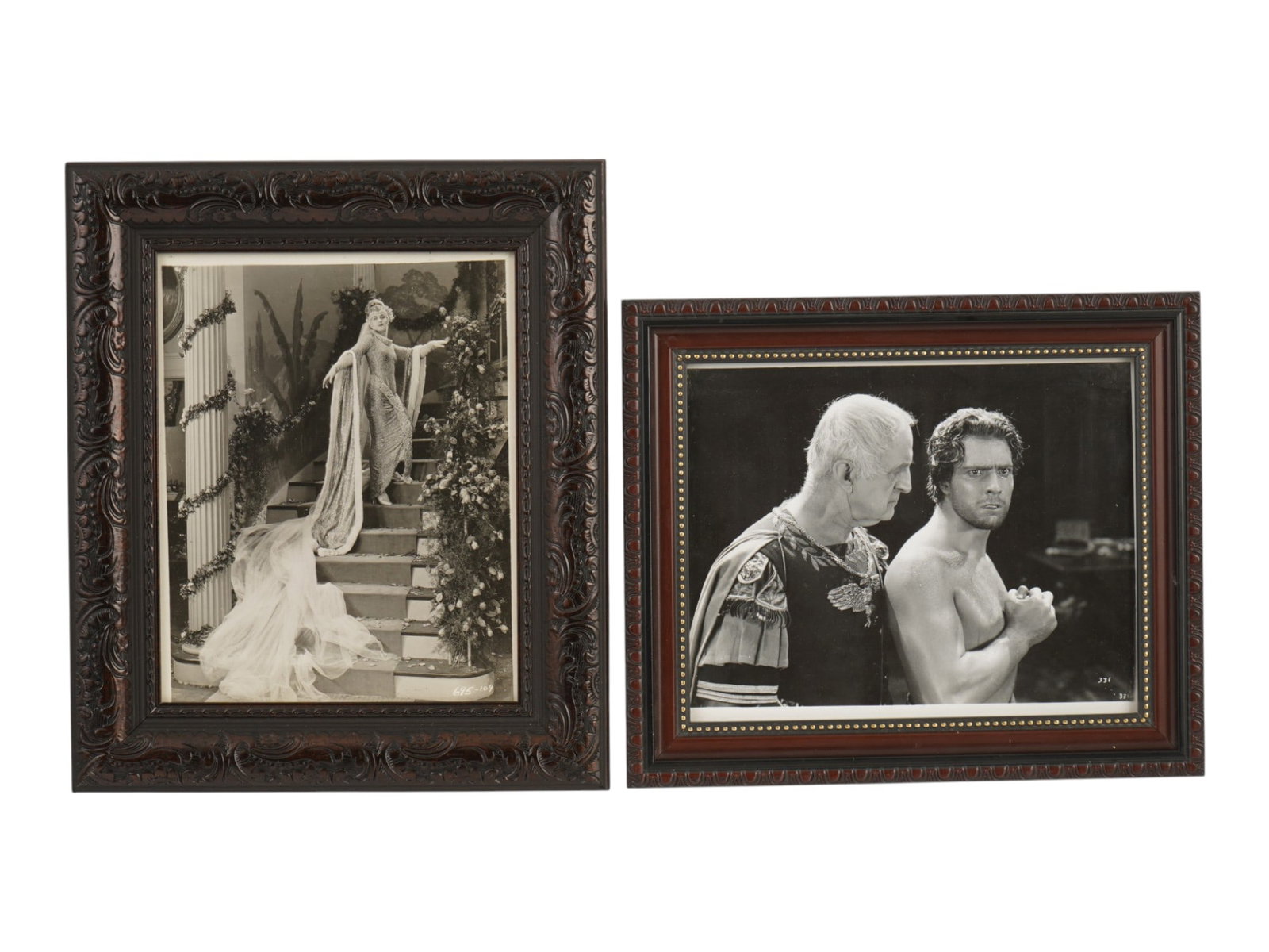 PAIR OF ORIGINAL ANTIQUE AMERICAN CINEMA PHOTOS: A pair of original antique American cinema photos. The first photo depicts the actress Theda Bara in the image of Madame Du Barry on the steps of the stairs in the scenery of the 1917 silent historica