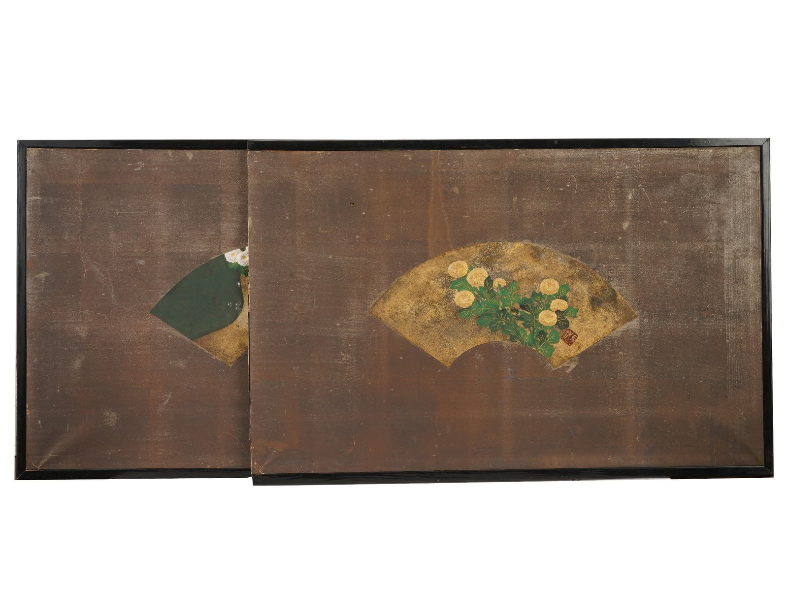 PAIR OF ASIAN FAN SHAPED MIXED MEDIA PAINTINGS FRAMED: A pair of Asian mixed media paintings on panel. Each depicts a central fan shaped vignette rendered in polychrome pigments and gold leaf. The compositions depict traditional floral motifs, including