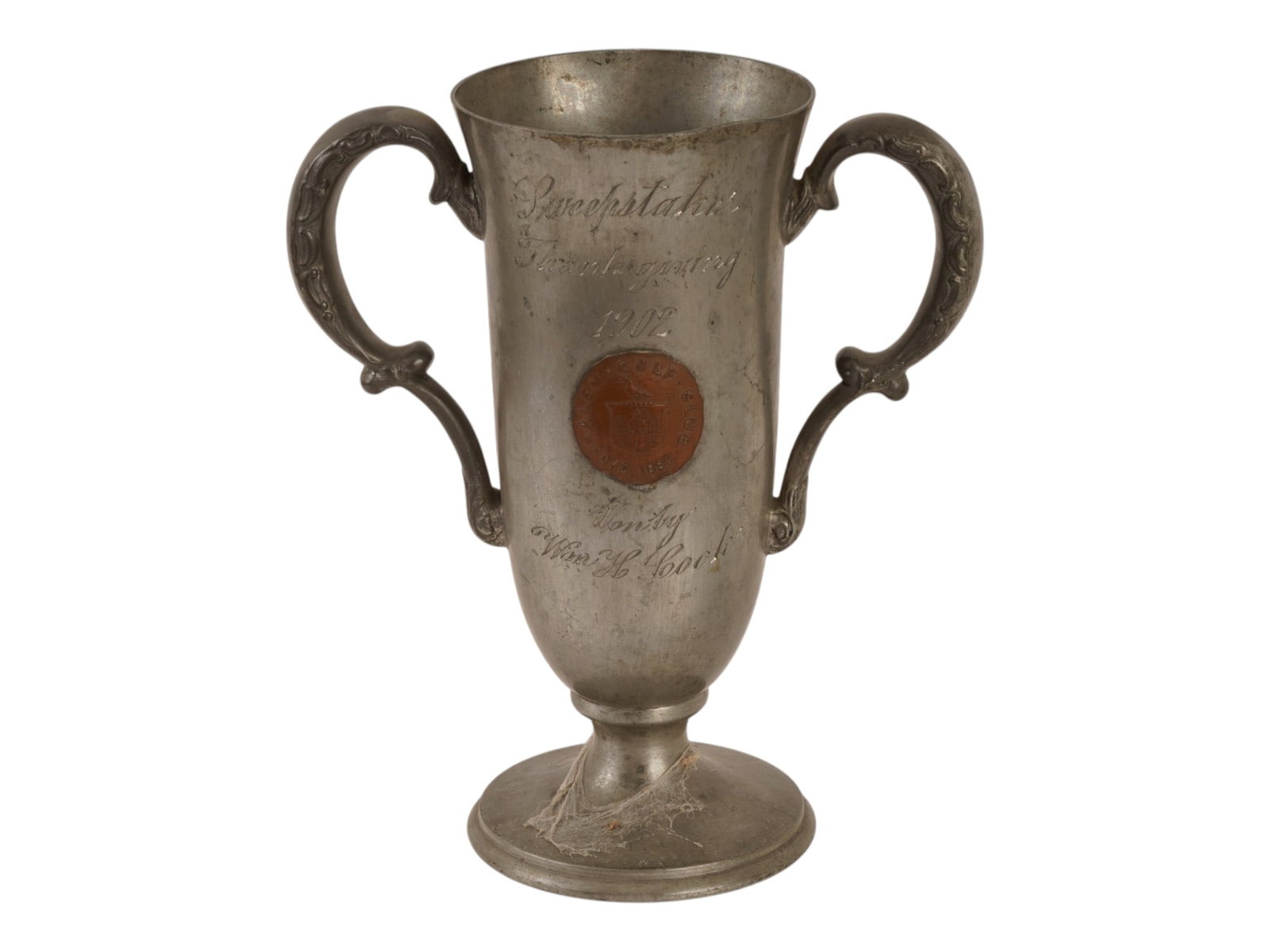 1902 AMERICAN SALEM GOLF CLUB TROPHY CUP: An early 20th-century American aluminum trophy cup. Twin-handled goblet with hand-engraved inscription on the front: Sweepstake Thanksgiving 1902, Won by William H. Cook. Salem Golf Club est. 1895
