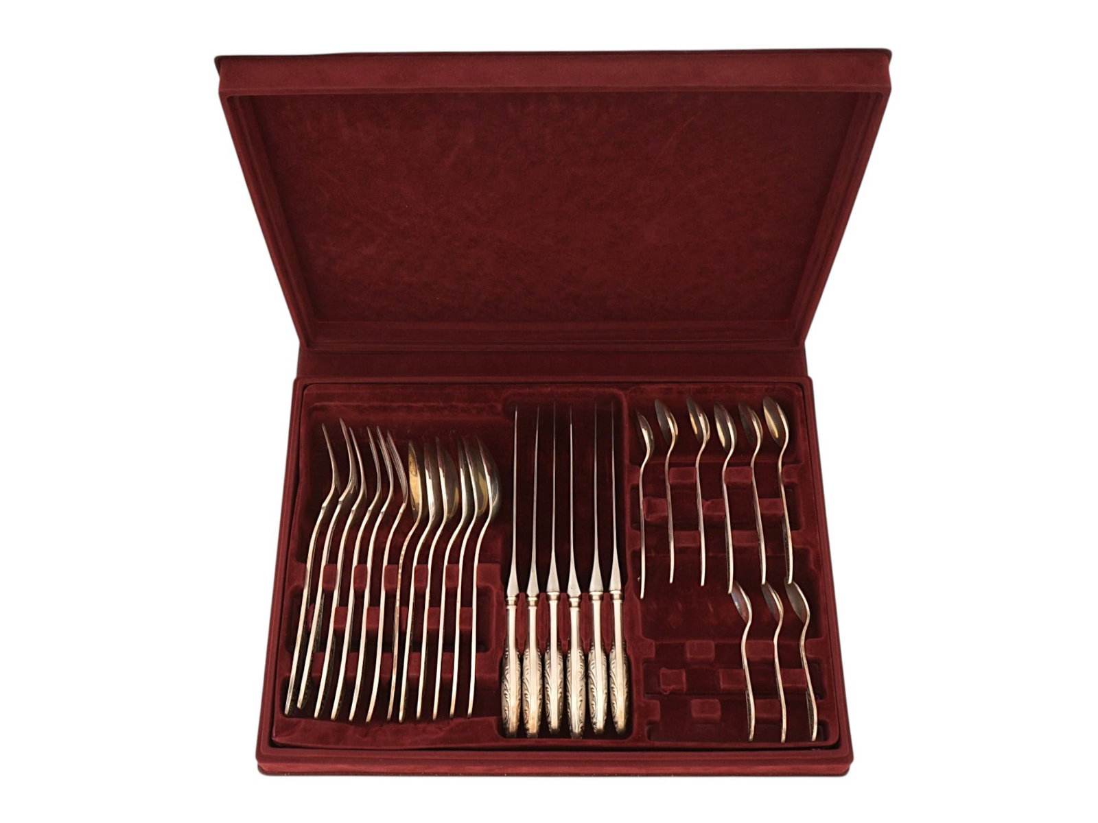 RUSSIAN SOVIET ERA KOLCHUGINO FLATWARE SET IN BOX: A vintage Russian Soviet era flatware set, manufactured by the renowned Kolchugino plant. The set includes pieces decorated with an ornate floral and scrollwork pattern, including dinner knives with s