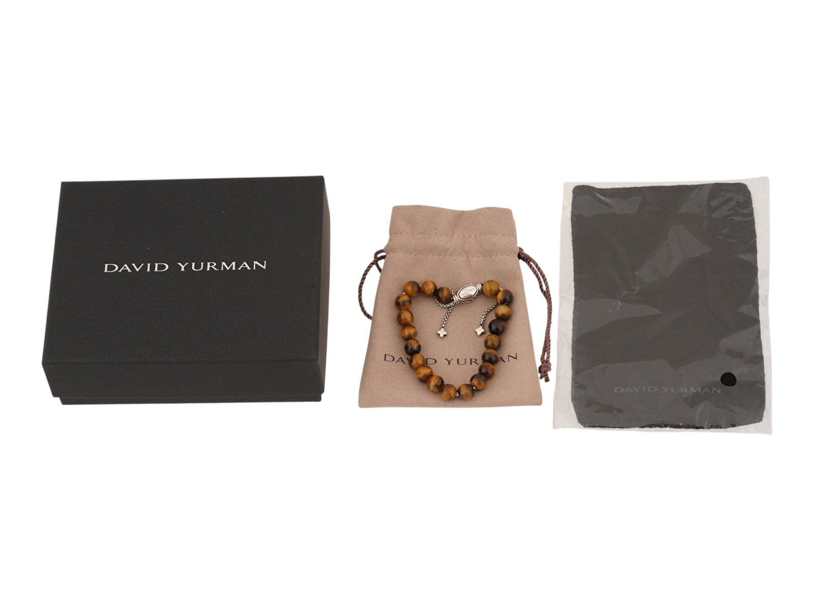 DAVID YURMAN STERLING SILVER TIGER EYE BEADED BRACELET: A mens bracelet made of Tigers Eye beads and Sterling Silver from the premium jewelry brand David Yurman. This piece is part of the renowned Spiritual Beads collection. The beads are held together by