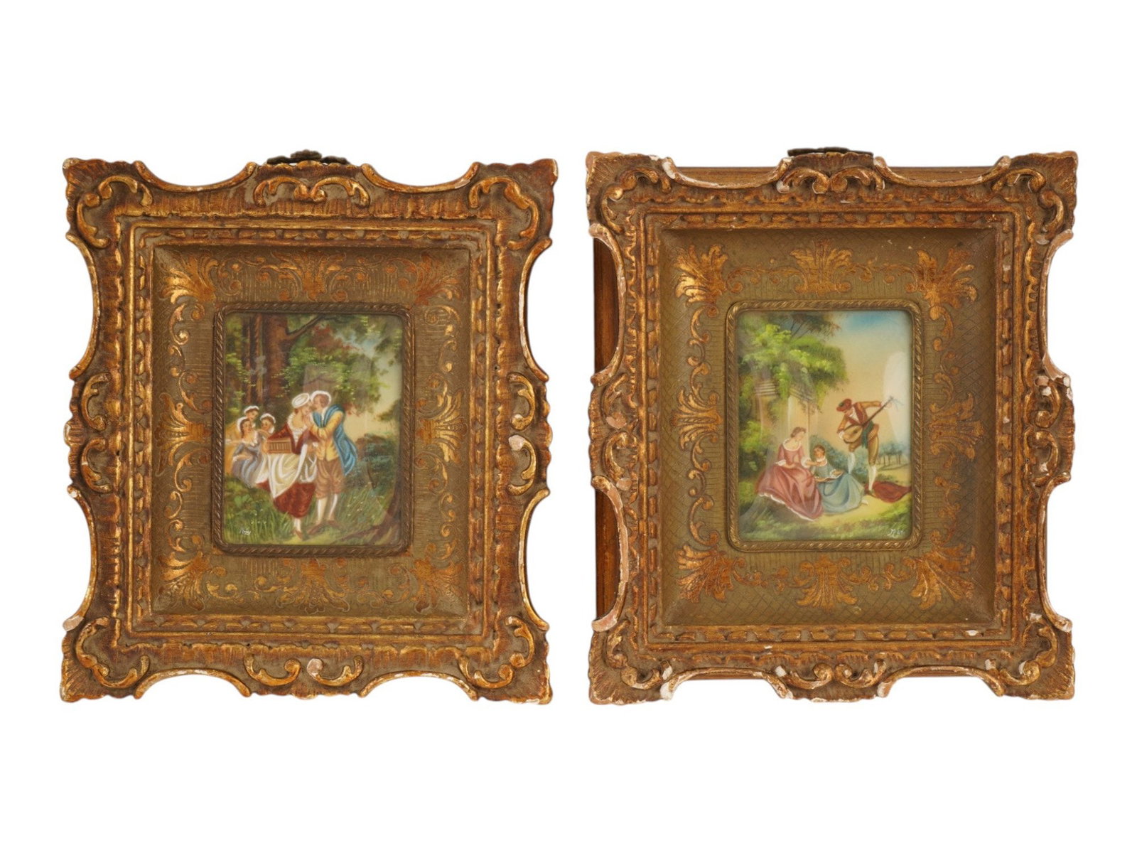 ANTIQUE FRENCH MINIATURE ROCOCO PASTORAL PAINTINGS: A pair of antique French miniature Rococo-style pastoral paintings depicting elegant fetes galantes courting scenes. The hand-painted plaques feature a gentleman and two women admiring a caged bird in