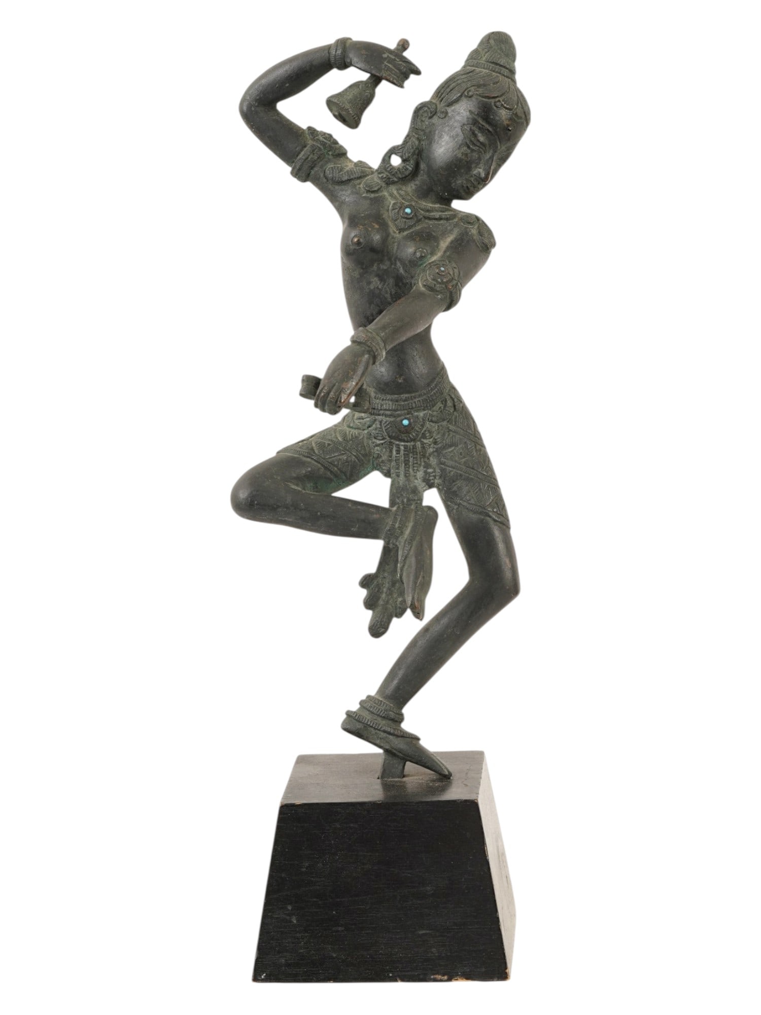 20TH CEN BRONZE DANCING DAKINI BUDDHIST SCULPTURE: A patinated bronze figure depicting a Dakini, a sacred feminine spirit in Vajrayana Buddhism, captured in a dynamic dancing posture known as ardhaparyanka. She is adorned with an ornate crown, beaded 