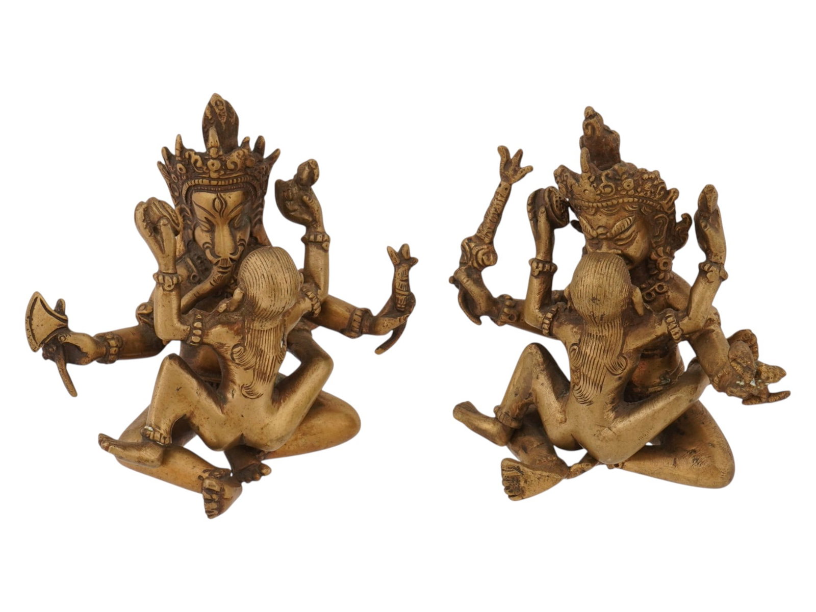 PAIR OF INDIAN EROTIC BRASS FIGURINES YAB YUM: A pair of Indian brass sculptures of Yab-Yum, a common symbol in the Tibetan Buddhist art depicting a male deity in union with his female consort. The male figure represents compassion and skillful