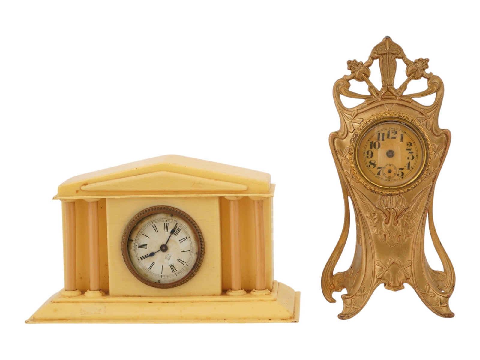 VINTAGE MANTEL DESK CLOCKS IN VARIOUS DECORATIVE STYLES: A pair of vintage mantel and desk clocks representing two distinctive decorative styles of the early 20th century. One features a molded case in the form of a neoclassical temple with columned