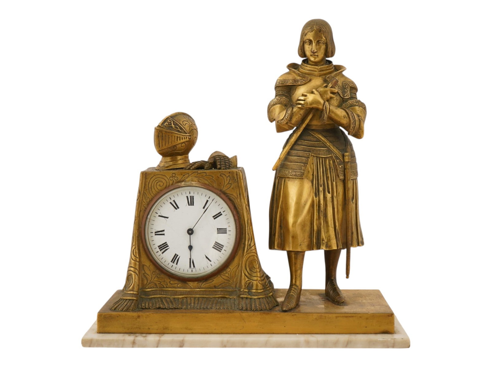 ANTIQUE GILT BRONZE FIGURAL MANTEL CLOCK JOAN OF ARC: An antique gilt bronze figural mantel clock modeled after Princess Marie dOrleans celebrated the 1837 sculpture of Joan of Arc. The figure stands in full armor with folded arms and sword, accompanied