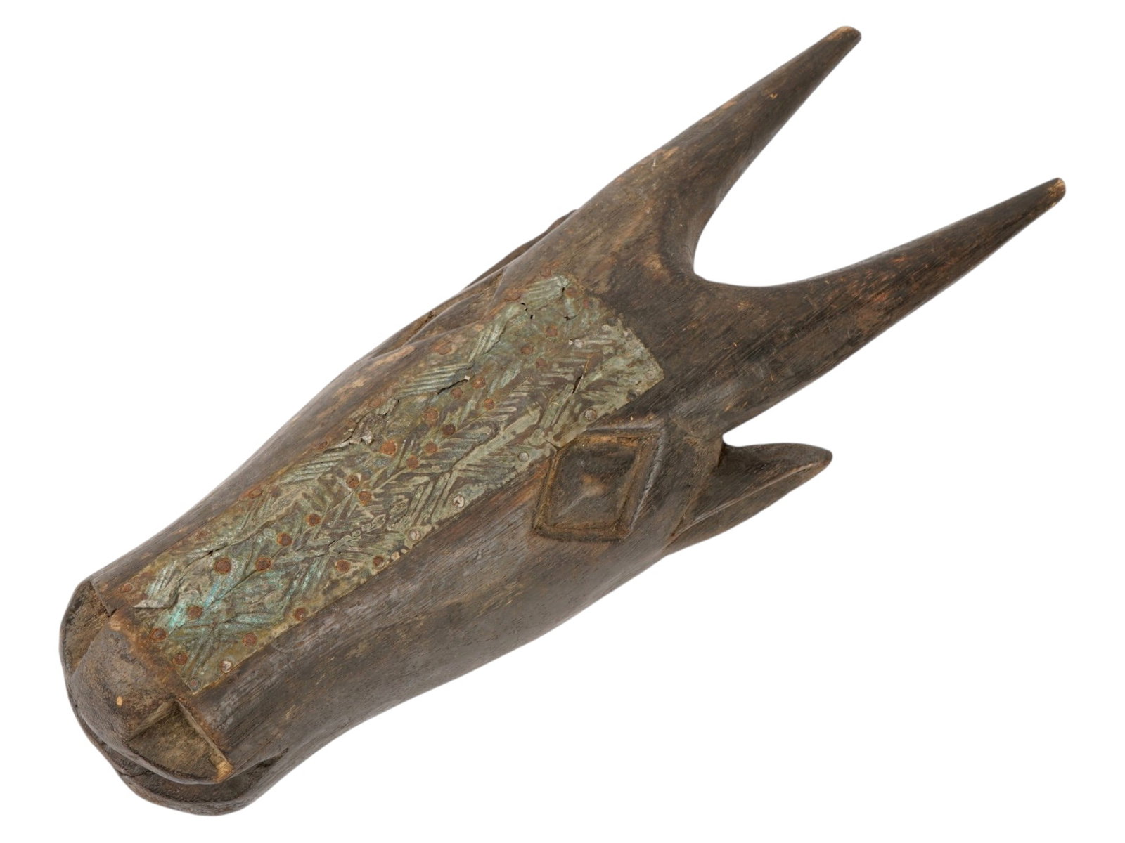 AFRICAN DOGON TRIBE HAND CARVED WOODEN HARVEST MASK: An African hand carved wooden mask originates from the Dogon tribe of Mali and features a stylized zoomorphic form, likely representing a bull or antelope associated with agricultural rituals. The