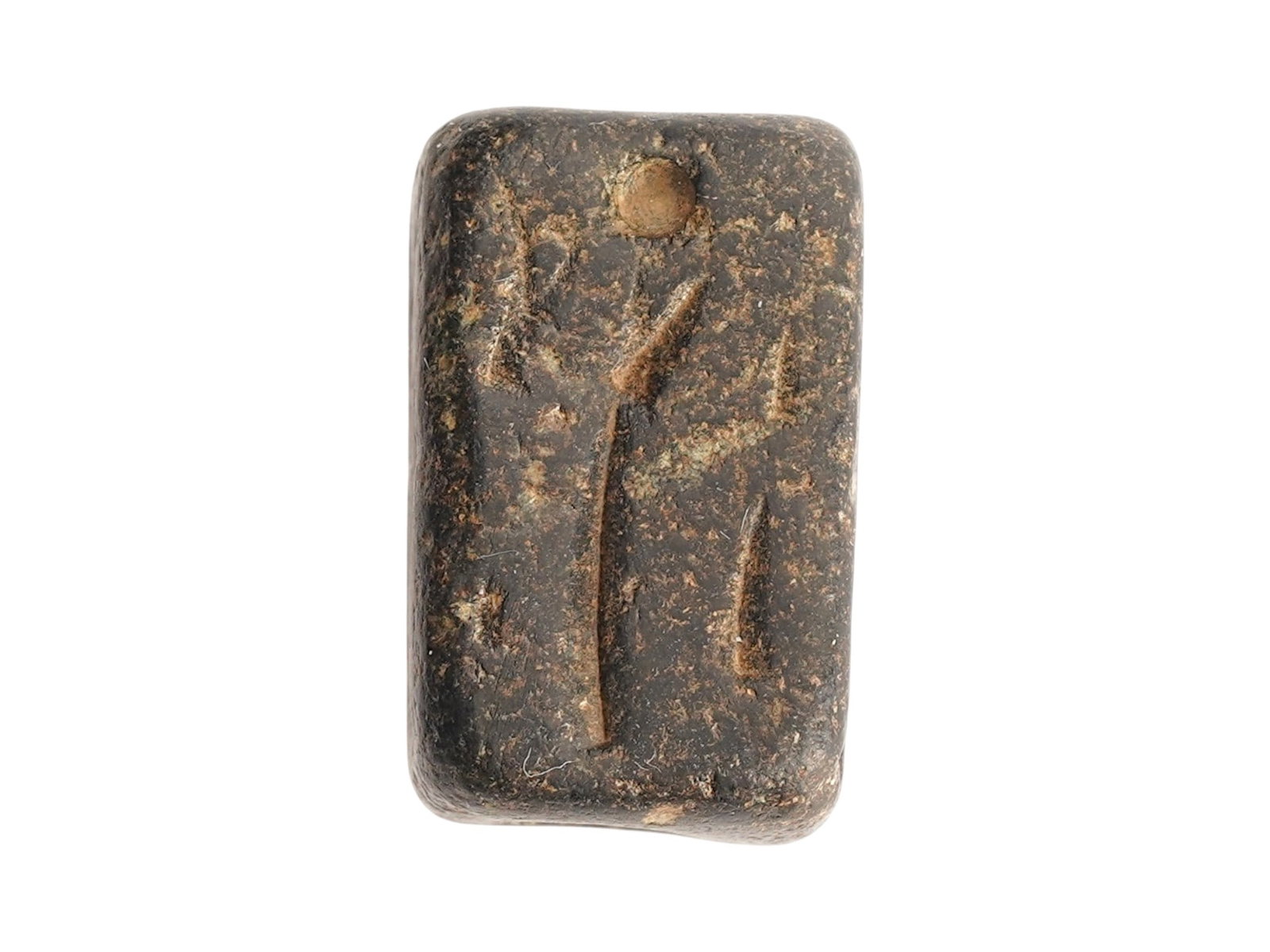 ANCIENT NEAR EASTERN STEATITE BEAD SEAL 1ST MILLENNIUM BC: An ancient Near Eastern hand carved Steatite stone bead seal, dating to the 1st to 2nd Millenium BC. The cylindrical shaped bead is engraved on four sides with an image representing animal and figures