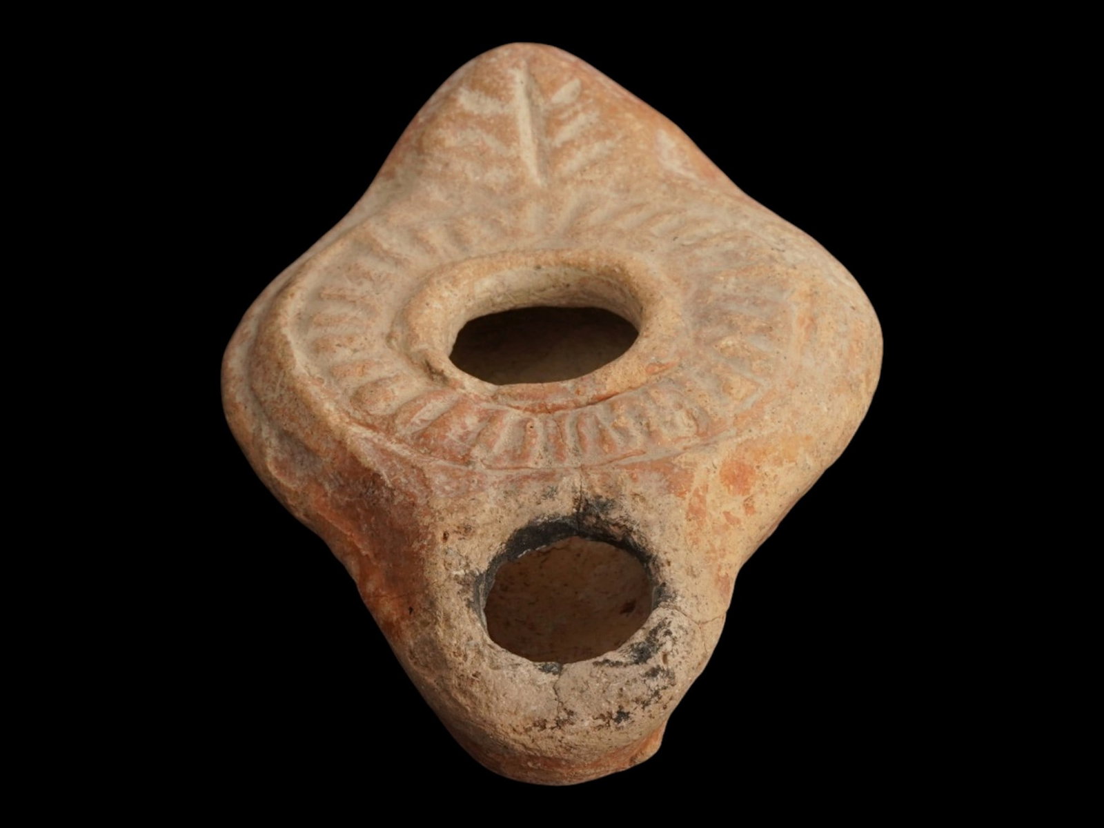 ANCIENT JUDAICA MENORAH TERACOTTA OIL LAMP ROMAN: An Ancient Roman terracotta oil lamp. Imperial Rome era, Holy Land, ca. 200 to 400 AD. Decorated with a menorah and sun relief. Historical Collectibles, Pottery And Ceramics, Judaica, Archaeological F