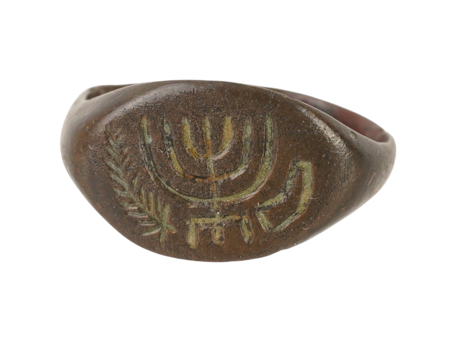 RARE ANCIENT JUDAICA ROMAN BRONZE RING 100 TO 300 AD: A rare ancient Roman Judaica bronze ring, circa 100 to 300 AD. The ring features an engraved image representing a menorah, a wreath of wheat and an incense shovel. Ancient Roman Rings And Jewelry Ware