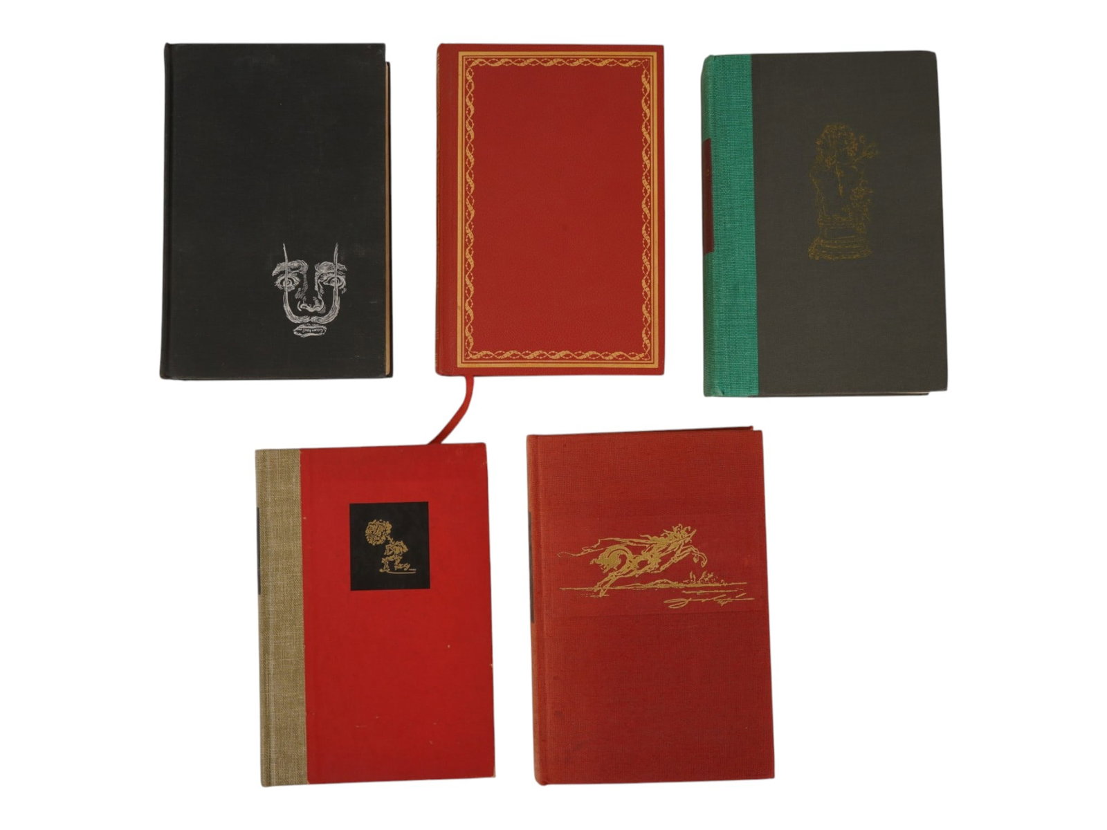 VINTAGE BOOKS ILLUSTRATED BY SALVADOR DALI: Group of five vintage hardcover books, including Salvador Dali-illustrated editions of Essays of Michel de Montaigne, The Autobiography of Benvenuto Cellini, and Wine, Women and Words, together with T