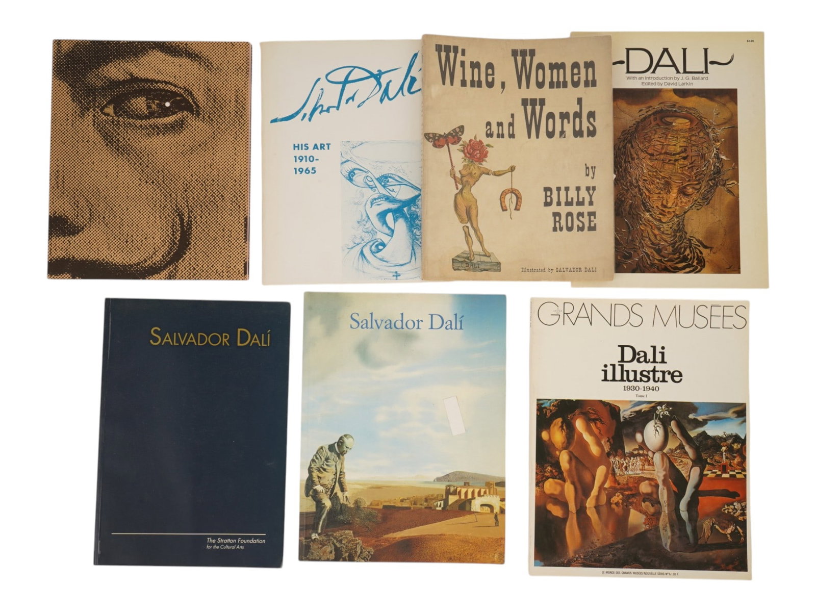 SALVADOR DALI ILLUSTRATED ALBUMS AND BOOKS: Group of seven vintage books, including Salvador Dali-illustrated edition of Wine, Women and Words by Billy Rose, as well as albums dedicated to the artist. Antiquarian Librarian Books And Publication