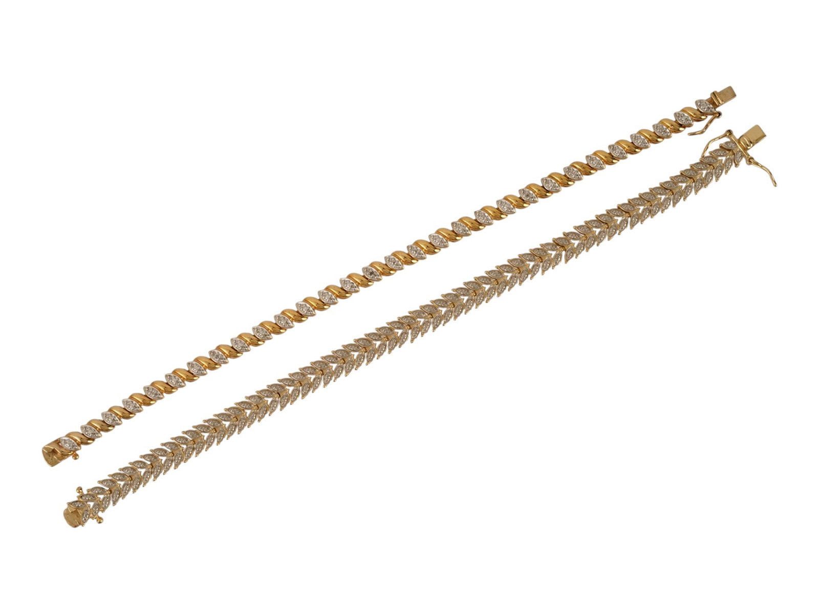 PAIR OF GILT STERLING SILVER LINK BRACELETS: A pair of vintage gilt sterling silver link bracelets of various design. The links are shaped as leaves and are decoratively riveted. Both braceles are marked 925 China on the clasp. Total Weight: 27.