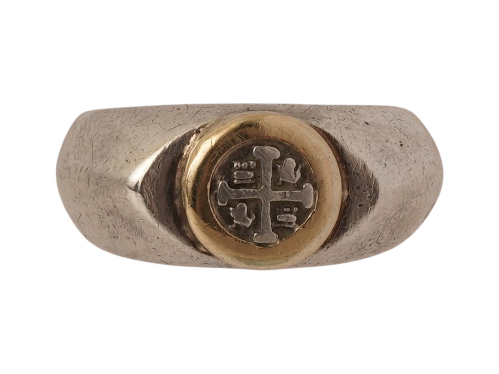 VINTAGE 14K GOLD AND STERLING SILVER CROSS RING: A vintage sterling silver signet ring. The crown depicts a relief Jerusalem cross in 14K yellow gold framing. Unmarked. Weight: 4.2 g. Vintage Religious Jewelry And Accessories. THIS LOT IS ELIGIBLE F
