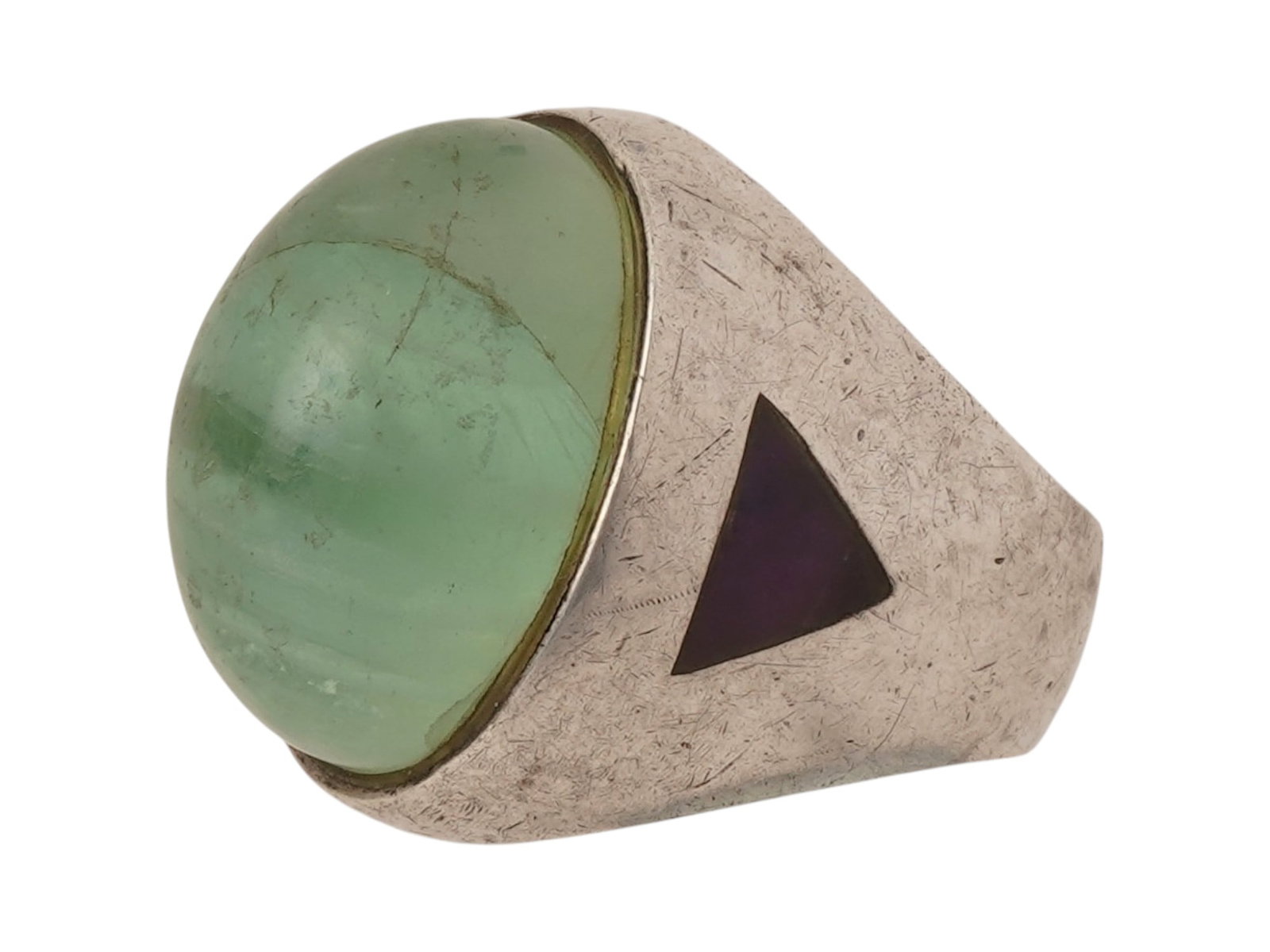 VINTAGE STERLING SILVER AND JADE STATEMENT RING: A vintage sterling silver ring. Set with a large oval jade cabochon flanked by black enamel triangles. Unmarked. Weight: 18.6 g. Vintage Statement Jewelry And Fashion Accessories. THIS LOT IS