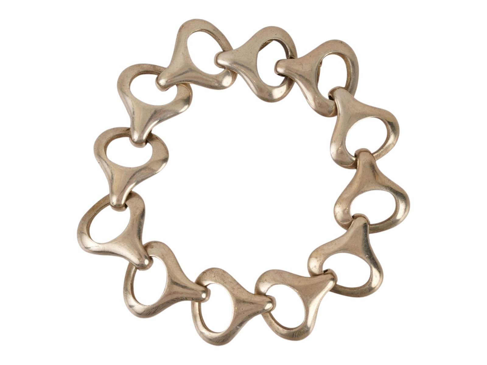 MODERNIST ITALIAN STERLING SILVER BRACELET MARKED: A modernist sterling silver bracelet composed of twelve interlocking openwork links of stylized geometric form. The piece is secured by an integrated hook clasp and bears the 925 fineness mark