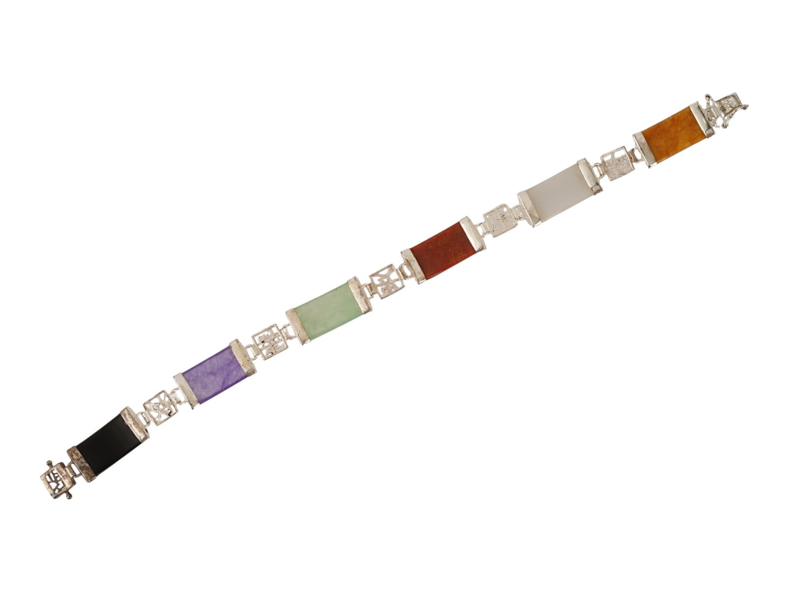 VINTAGE CHINESE JADE AND STERLING SILVER LINK BRACELET: A vintage Chinese multi-color jadeite jade and sterling silver link panel bracelet, likely dating to the mid late-20th century. The bracelet features six rectangular jade panels in black, lavender, gr