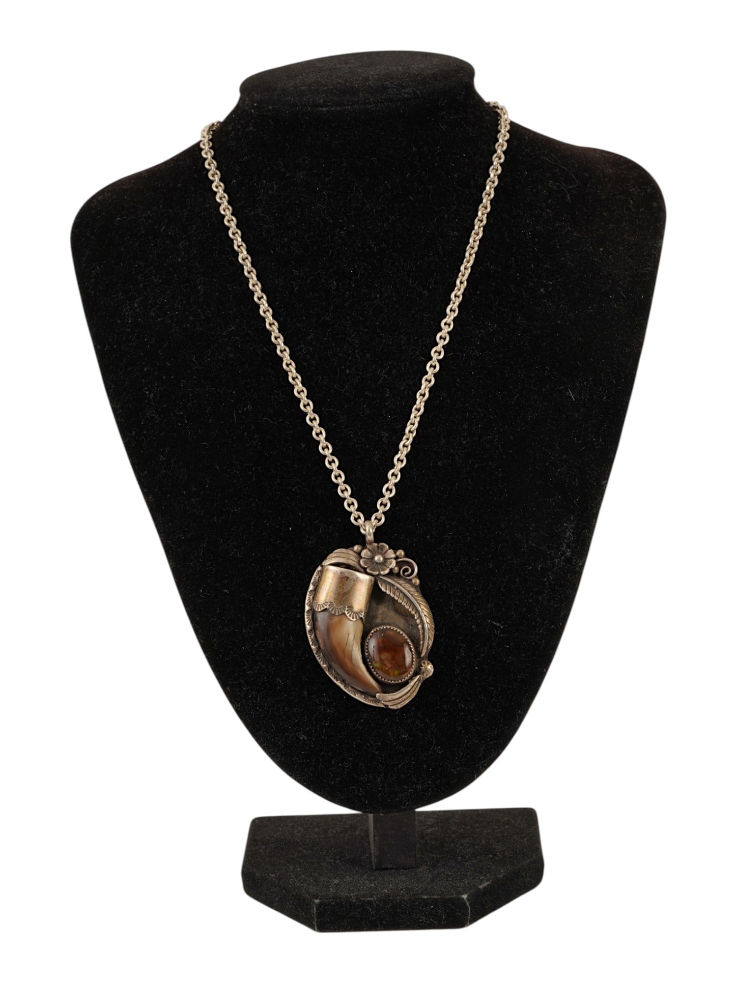 VINTAGE STERLING SILVER AGATE AND TOOTH NECKLACE: A vintage sterling silver chain necklace with a large medallion featuring a tooth made of natural materials and fire agate cabochon. Marked JRM on the backside, 925 on the clasp. Vintage Statement Jew