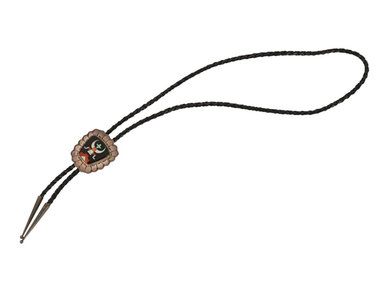 VINTAGE STERLING SILVER AND GEMSTONE MOSAIC BOLO TIE: A vintage sterling silver and leather cord bolo tie. The silver part is inlaid with turquoise, carnelian, and mother-of-pearl, representing a stylized human figure. Unmarked. Vintage Jewelry And Fashi