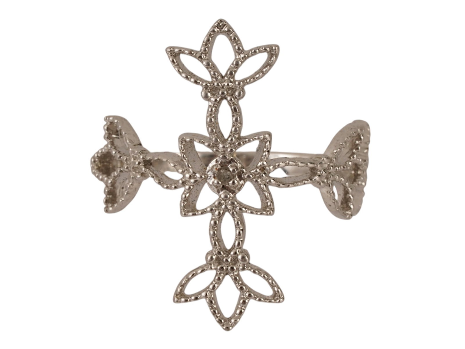 STERLING SILVER FILIGREE CROSS RING WITH DIAMOND: A sterling silver jewelry ring featuring an openwork cross motif rendered in a filigree style, accented by a single round cut diamond at the center. The cross arms terminate in stylized foliate tips, 