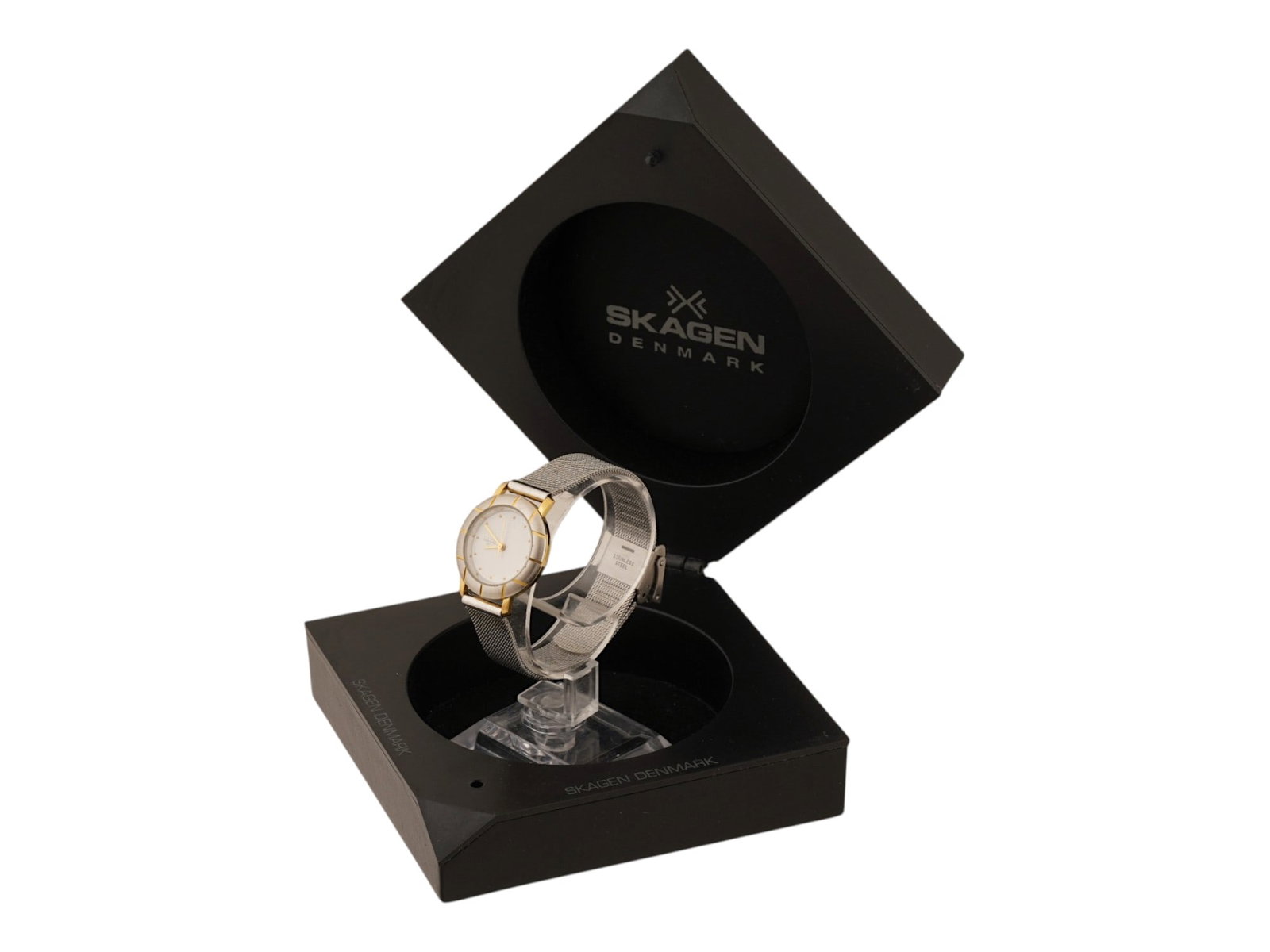 SKAGEN DENMARK TWO TONE MESH STRAP WRISTWATCH IOB: A Skagen Denmark wristwatch featuring a slim, round stainless steel case with a two tone silver and gold toned finish. The minimalist silver tone dial is accented by gold tone hour markers and matchin