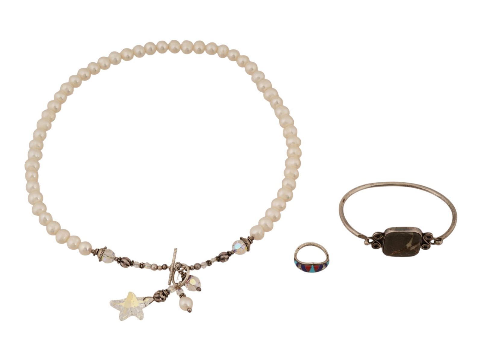 COLLECTION OF SILVER JEWELRY BRACELET RING AND NECKLACE: A collection of artisan jewelry including a faux-pearl necklace with a crystal star charm, a sterling silver wire cuff bracelet centered with a square brown stone, and a sterling silver inlay ring dec