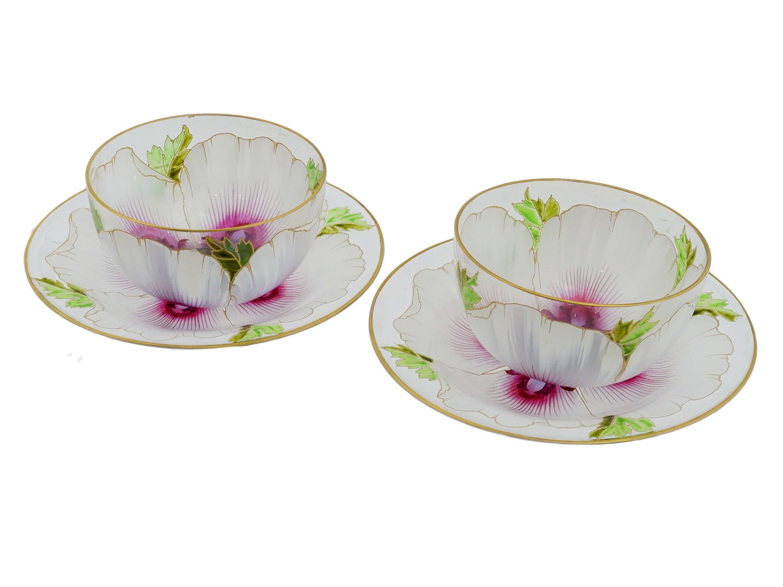 ANTIQUE AUSTRIAN ENAMELED GLASS BOWLS WITH UNDERPLATES: A pair of antique Austrian Secessionist enameled art glass finger bowls with matching underplates, produced circa 1900. Each bowl is modeled in the form of an opening poppy flower with vibrant purple,