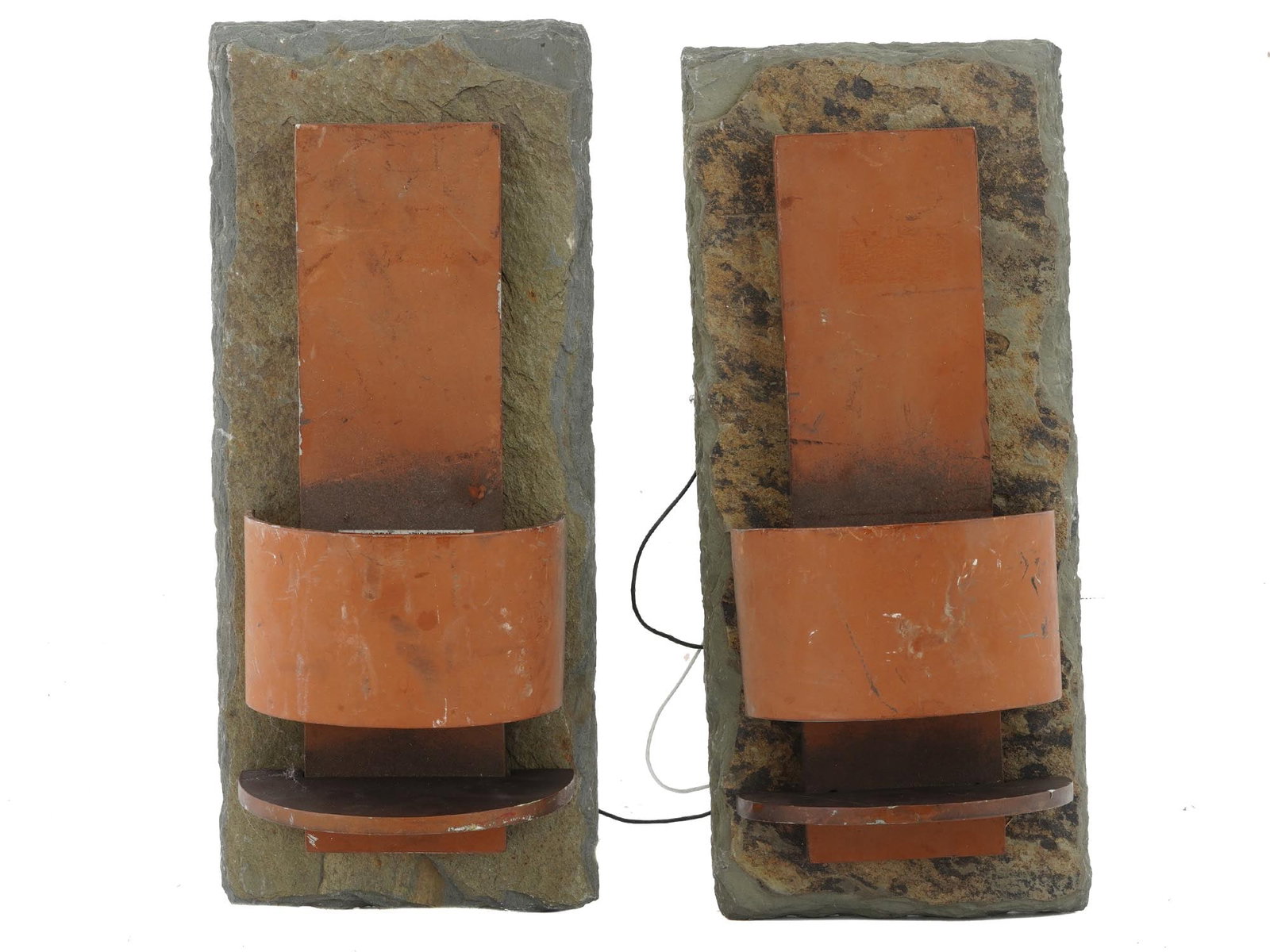 CERAMIC VOLCANIC ROCK WALL PLAQUE CANDLE LAMP HOLDERS: A pair of wall mounted candle or lamp holders, crafted from a combination of ceramic and volcanic rock. Each holder features a sturdy backplate made of natural volcanic rock. The holders are cleverly 