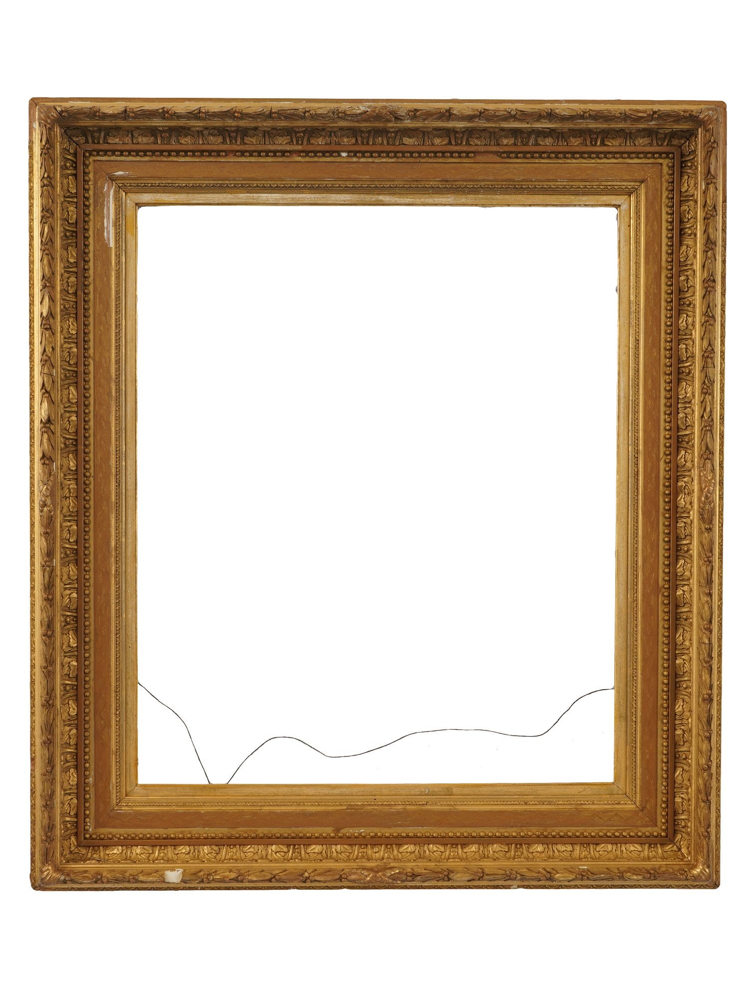 VINTAGE RECTANGULAR ORNATE GILDED WOODEN FRAME: A rectangular frame, constructed from wood and gesso with a traditional gold toned gilded finish. The design features a deep cove profile accented by a beaded inner fillet and an ornate patterned oute