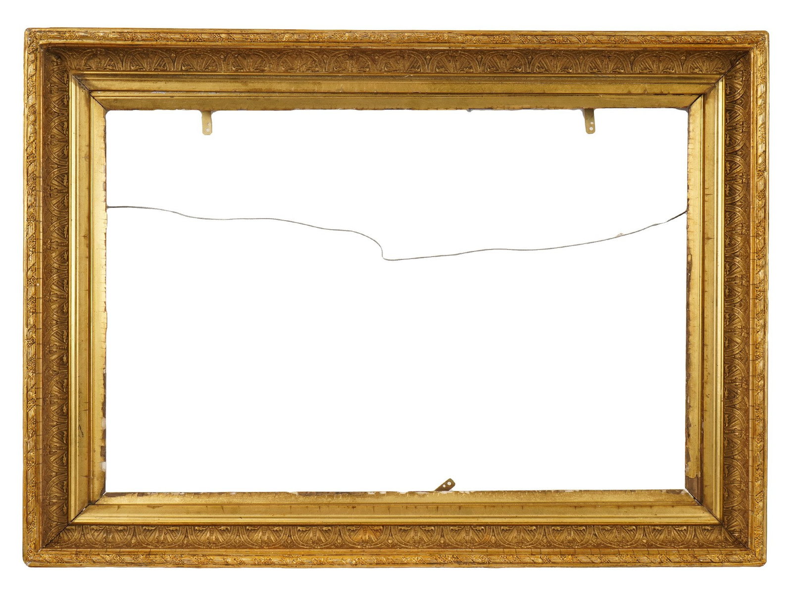 VINTAGE CLASSICAL STYLE GILDED WOOD PICTURE FRAME: A rectangular picture frame constructed of wood with a multi tiered profile featuring a prominent cove and a decorative foliate pattern along the outer edge. The surface is finished in a warm gold gil
