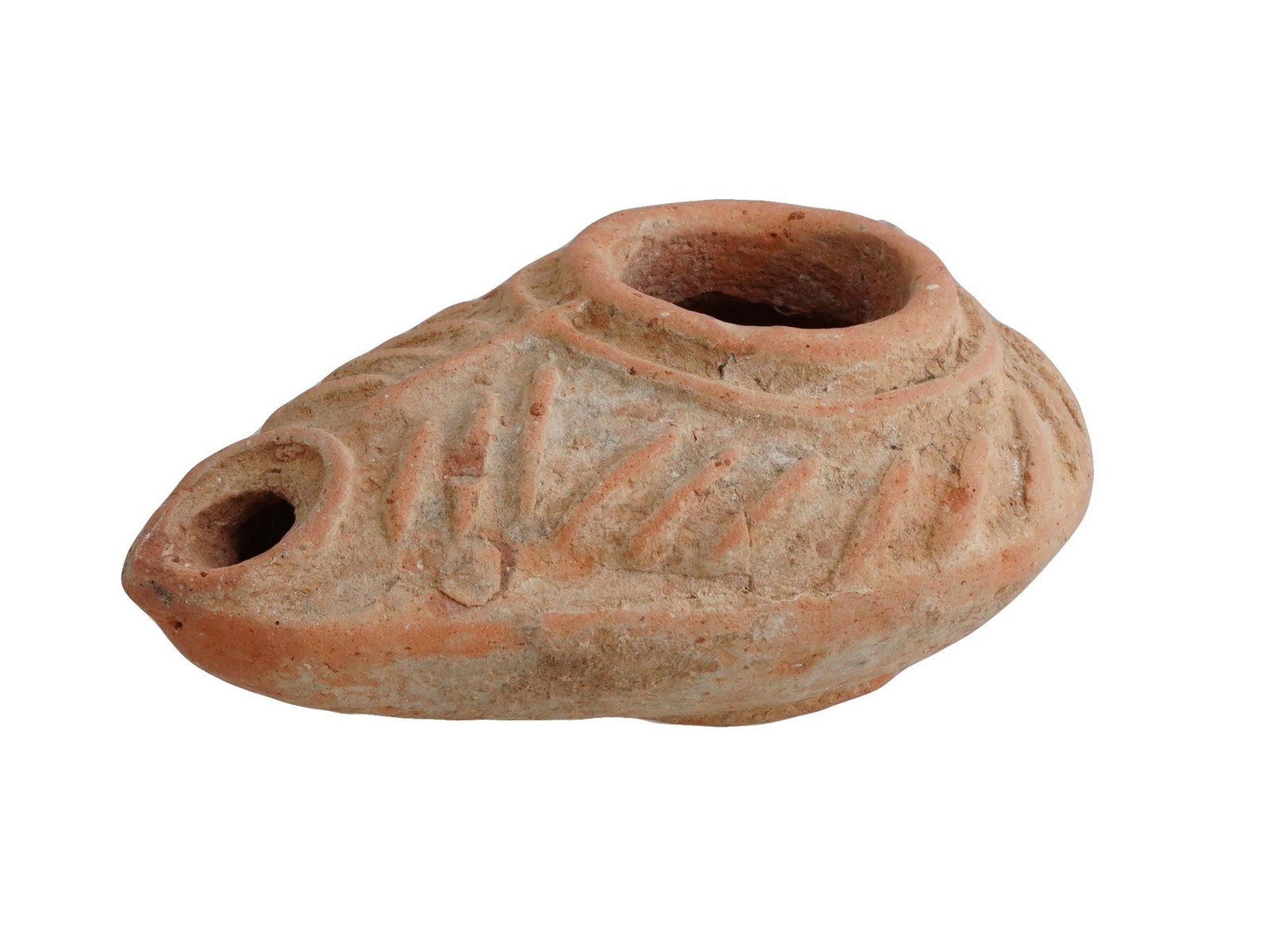 ANCIENT JUDAICA 7 BRANCH MENORAH OIL LAMP ROMAN: An Ancient Roman terracotta oil lamp featuring a relief Seven Branch Menorah design. Imperial Rome era, ca. 100 to 300 AD. Made of unglazed clay. Classic shape. The seven-branched menorah was original
