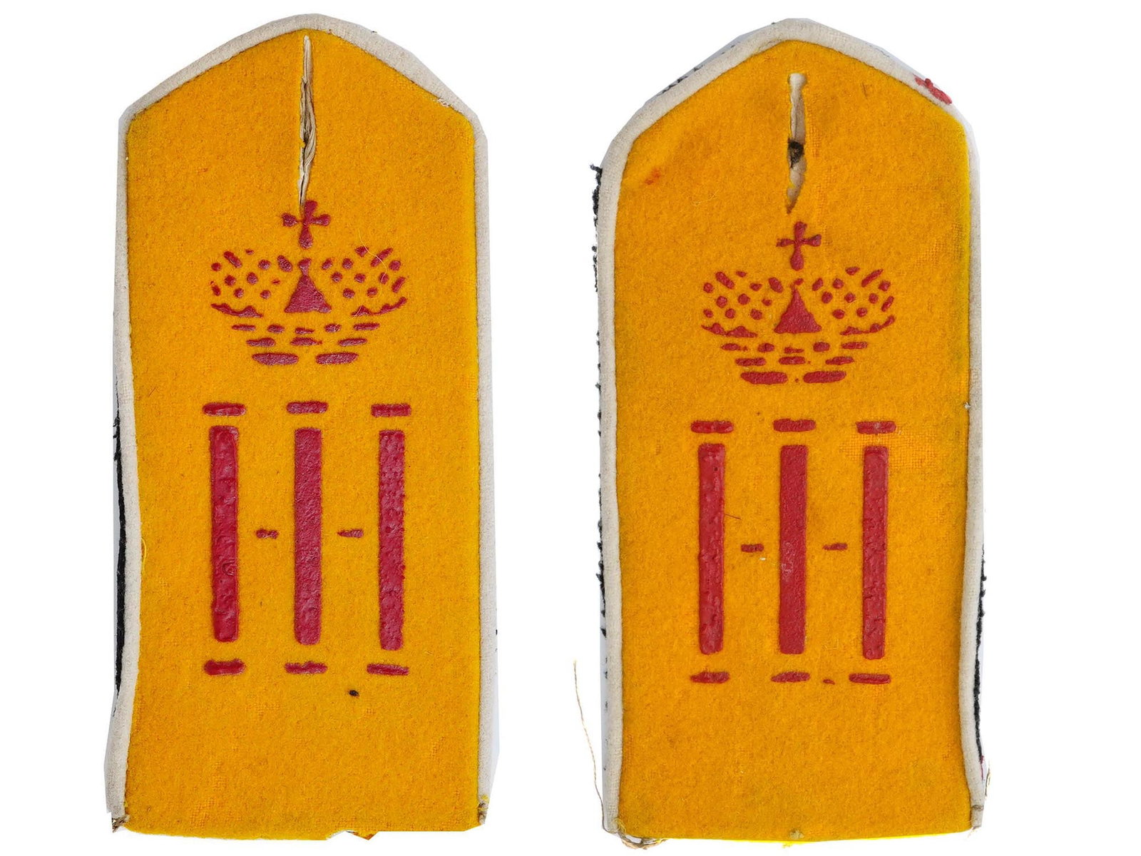 ANTIQUE RUSSIAN EMPIRE MILITARY SHOULDER BOARDS: A pair of antique Russian Empire shoulder boards for a private of the 9th Grenadier Siberian Field Marshal General Grand Duke Nicholas Nikolaevich of Russia Regiment. Crafted from wool and cloth, pain