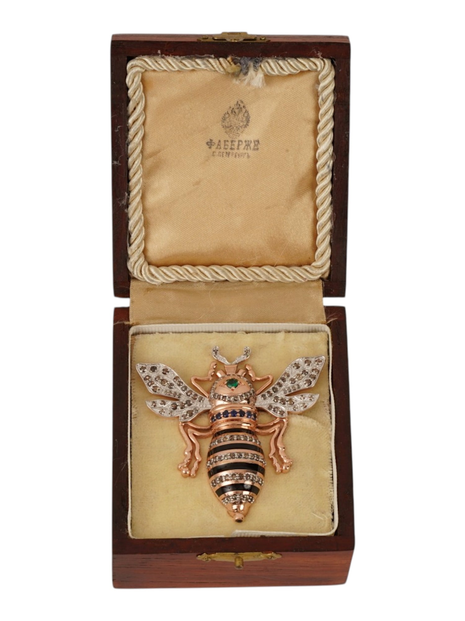 RUSSIAN 14K GOLD SILVER BROOCH DIAMOND SAPPHIRES EMERALD: A Russian figural brooch is cast in 14K gold and silver in the form of a naturalistic bee. The wings and segments of the abdomen are set with numerous diamonds, while the thorax features a row of