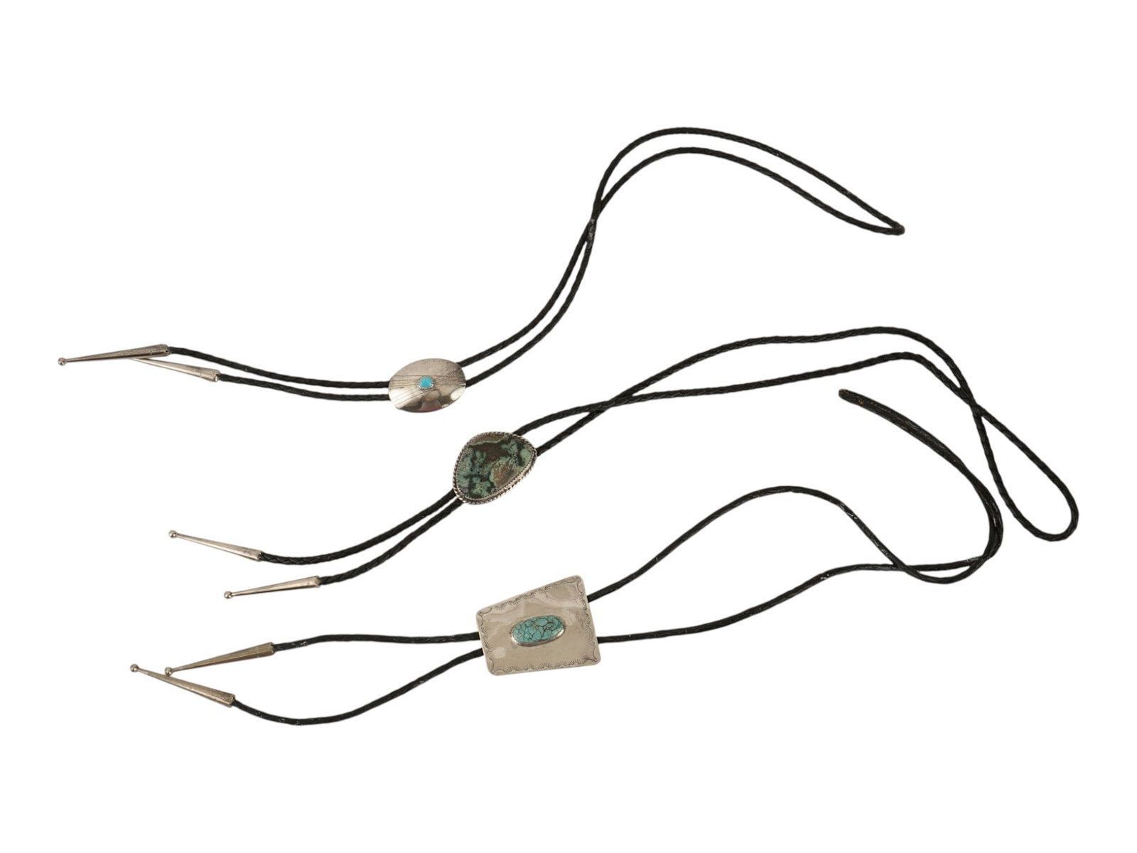 VINTAGE AMERICAN OLD PAWN STERLING SILVER BOLO TIES: A set of three vintage American Old Pawn sterling silver bolo ties, each featuring a distinct natural turquoise stone and handcrafted silver slide. The set includes a brushed oval with a small blue tu