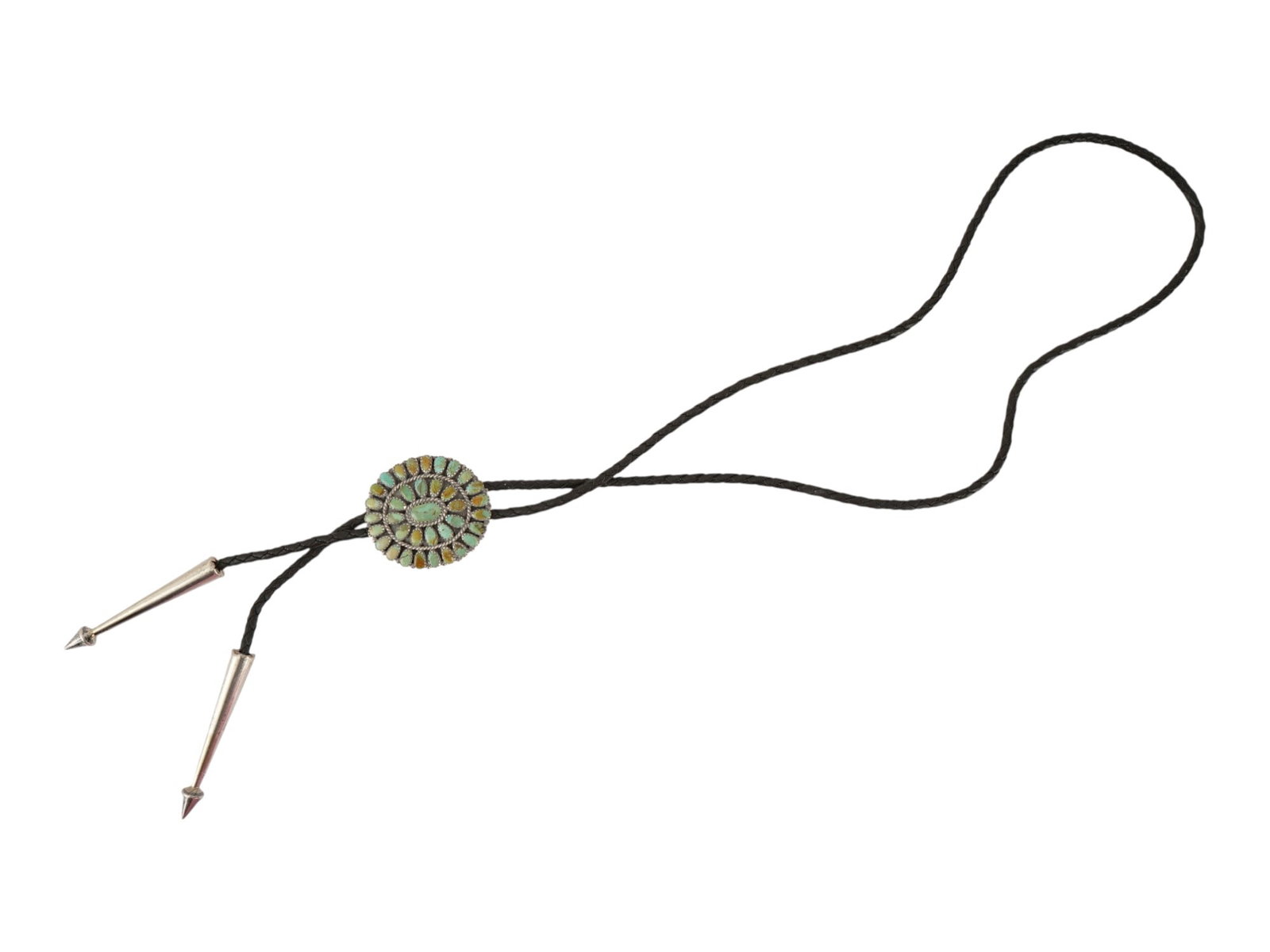 OLD PAWN STERLING SILVER AND TURQUOISE BOLO TIE: A vintage sterling silver and leather cord bolo tie. The silver part is richly inlaid with turquoise, representing an oval medallion. Marked Navajo Sterling, Made in USA on the backside. Total weight: