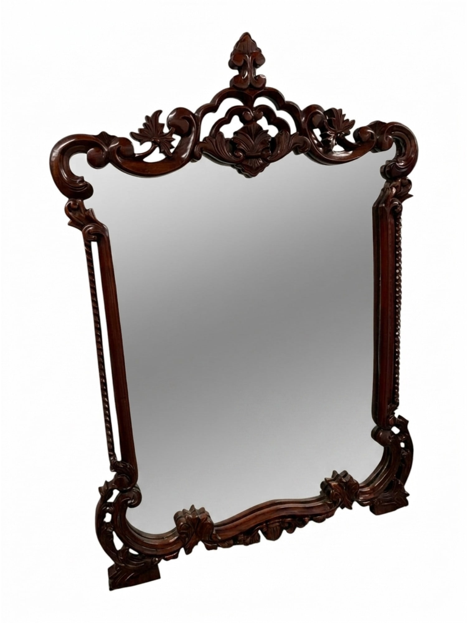 VINTAGE HAND CARVED MAHOGANY FRAME WALL MIRROR: A vintage wall mirror in hand-carved mahogany wood frame. Vertical rectangular format. Elaborate pierced leaf frame design. Unmarked. Collectible Wall Decor, Mirrors, Interior Design. THIS LOT IS ELIG