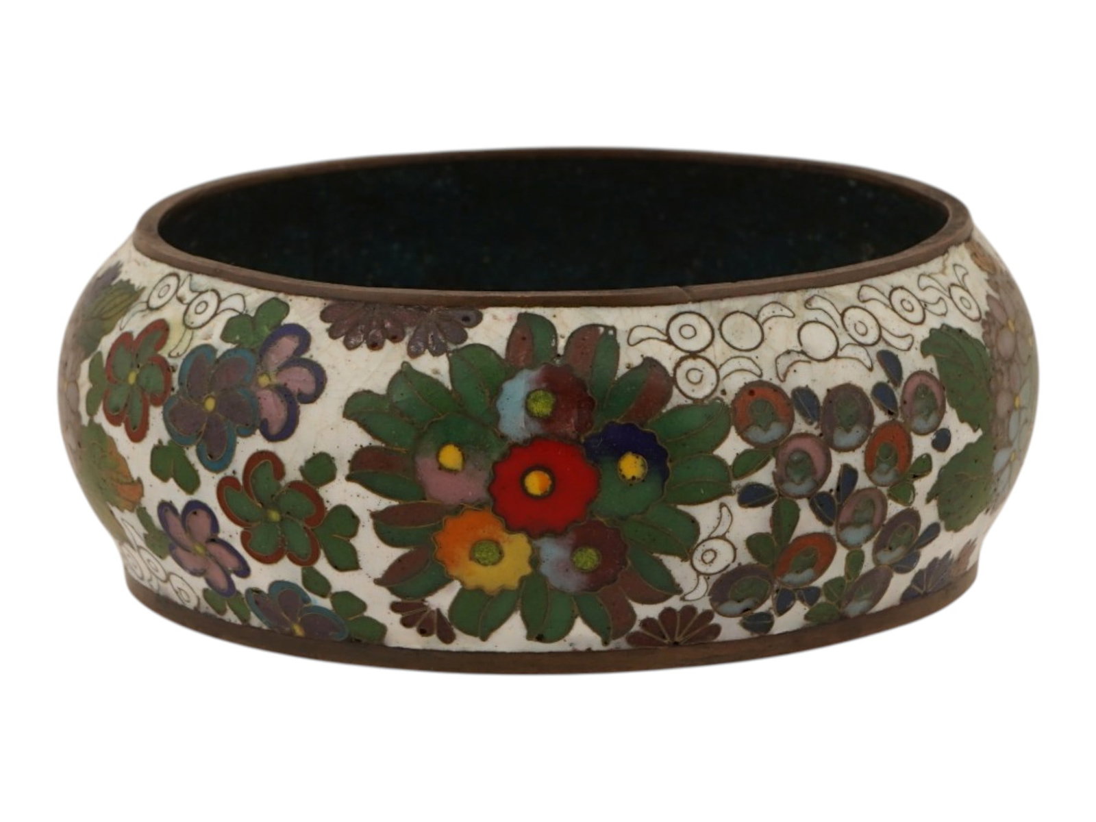 ANTIQUE JAPANESE MEIJI CLOISONNE ENAMEL BOWL: An antique Japanese copper bowl with cloisonne enamel surface. Late Meiji period, before 1912. Round piece with spherical sides garnished with floral ornaments against the white background. Unmarked. 