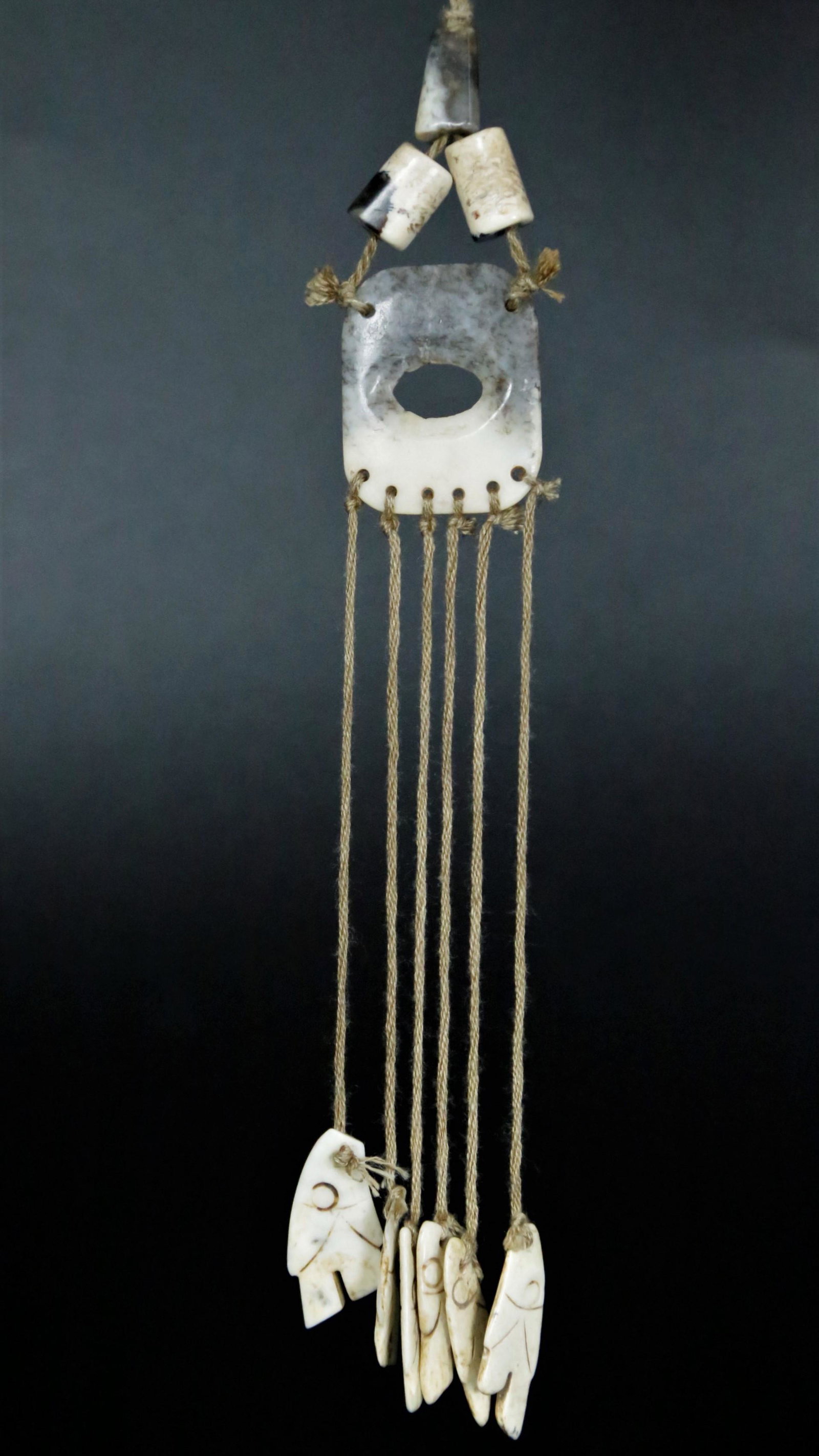 A chikeb bone white jade pendant: A chikeb bone white jade pendant Chinese Han Dynasty Size:21.5cmx2.8cm(1in=2.54cmï¼‰