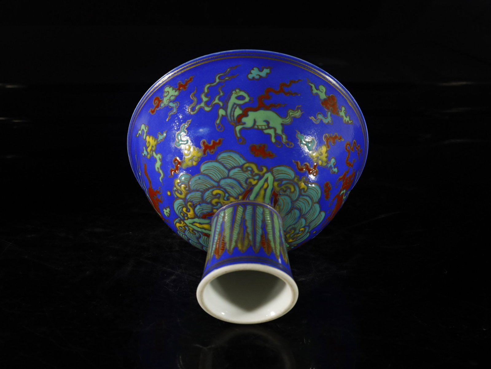 A blue-ground wucai 'horse' cup: A blue-ground wucai 'horse' cup Chinese Ming Dynasty Mark of ChengHua Size:16cmx12cm