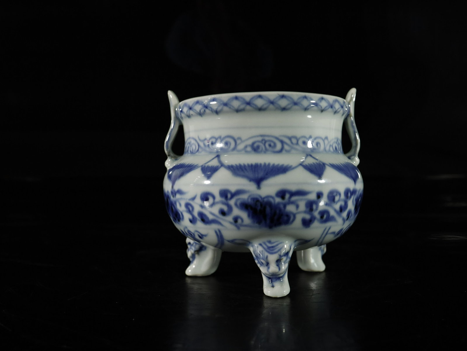 A blue and white 'flower' censer: A blue and white 'flower' censer Chinese Ming Dynasty size: 14cmx11.5cm
