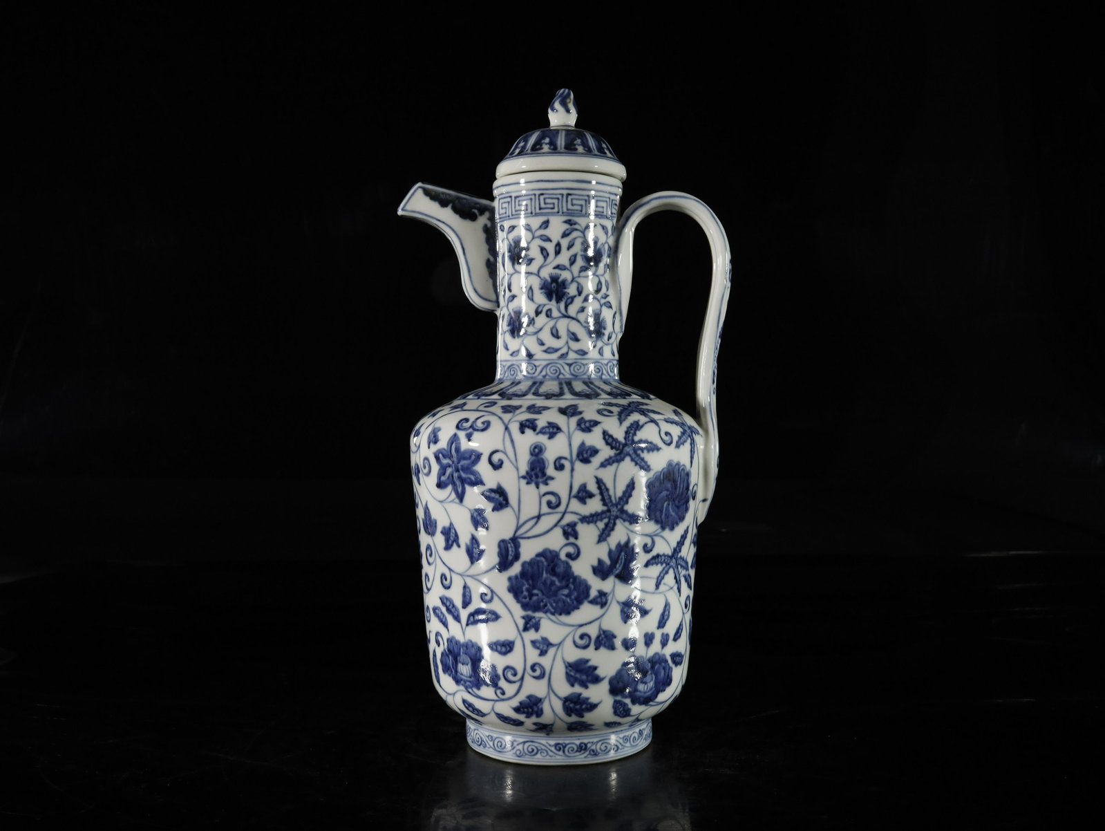 A Blue and White 'Flower' Ewer: A Blue and White 'Flower' Ewer Chinese Ming Dynasty Size: 21cmx41cm