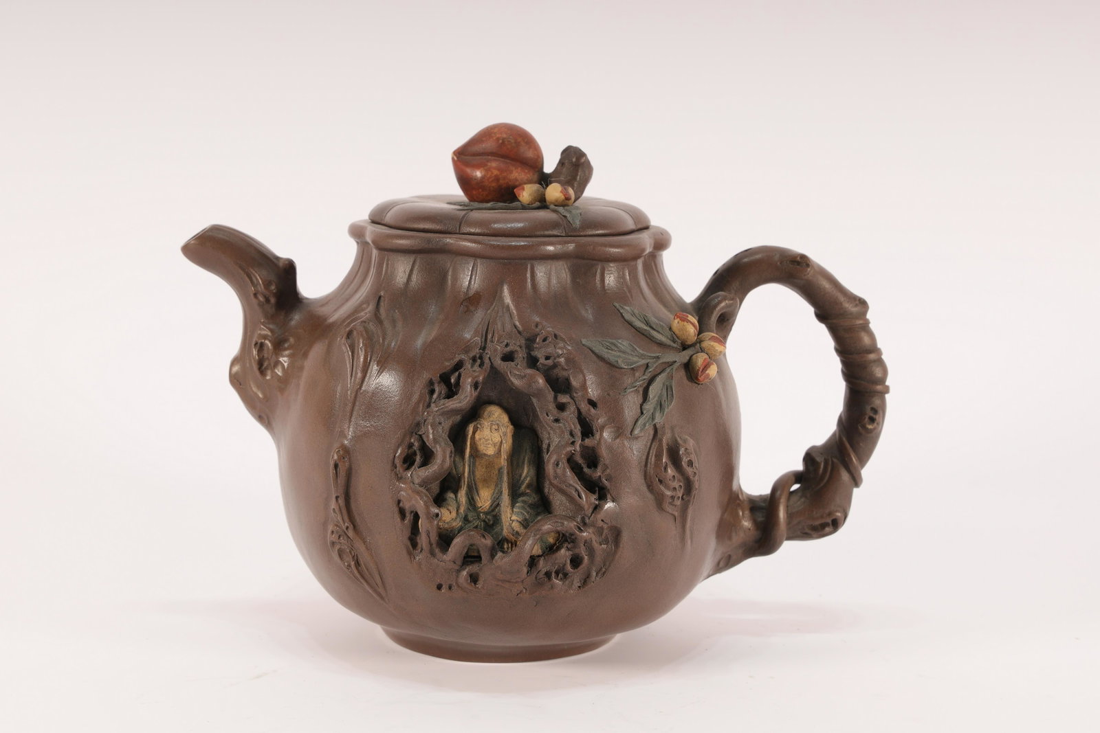 A Fine â€˜Character' Dark-red Enameled Pottery: A Fine â€˜Character' Dark-red Enameled Pottery with a Moulded Peach Chinese Qing Dynasty Size: 19.5cmX13cmX14.5cm