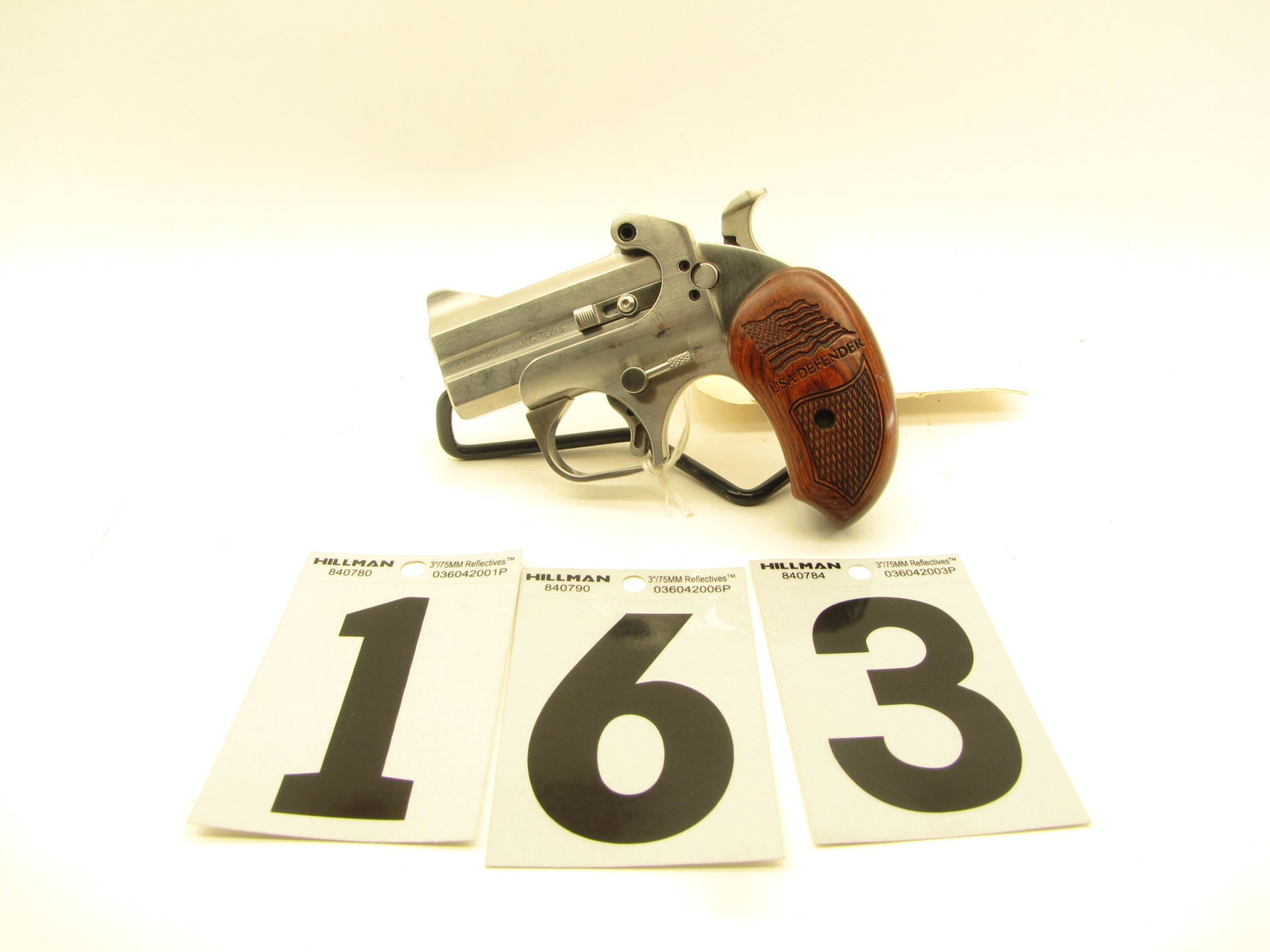 Bond Arms USA Defender Derringer 45 LC & 2 1/2" 410: Good condition normal wear and use marks 3" Barrel and rosewood grips light scratches on frame