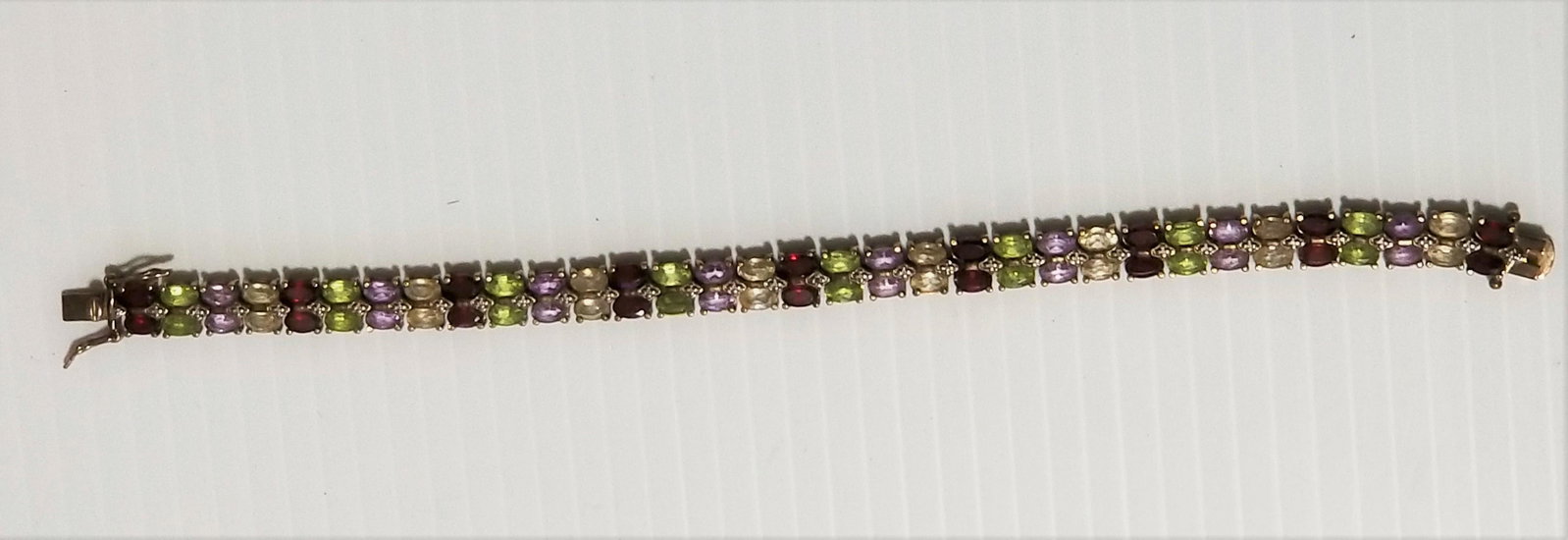 Nice 925 Different Colors Stones Bracelet: 925 sterling silver, length: 8 inches, width: 6 mm, multicolor amethyst, peridot, garnet, lemon quartz.
